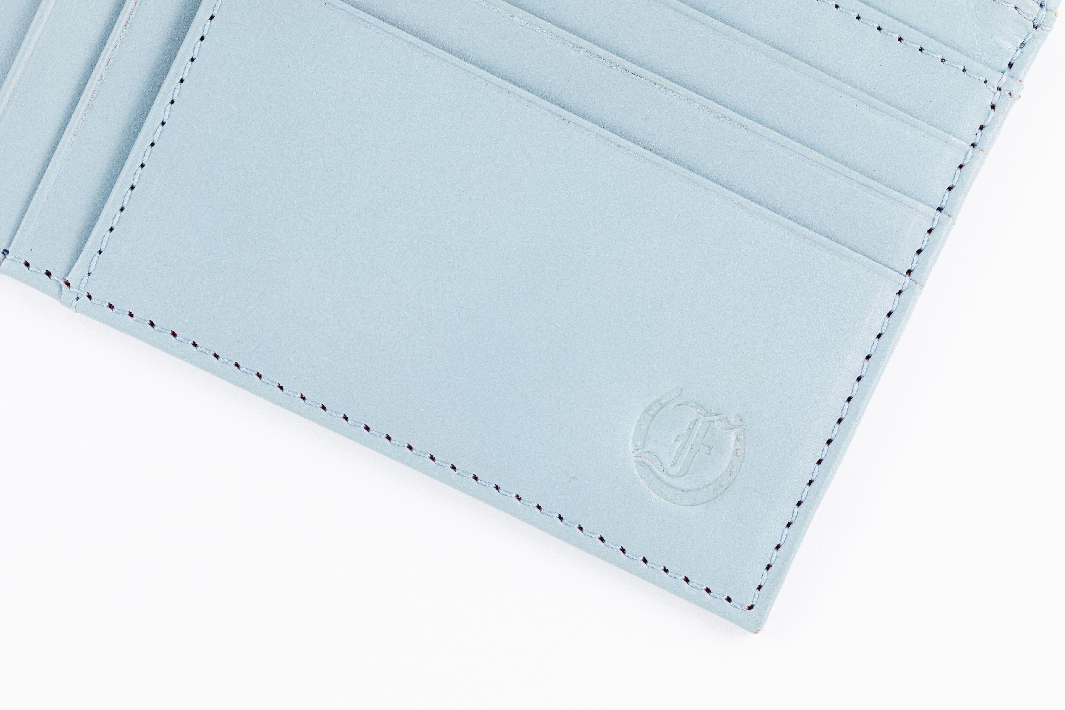 Freedman's Zip Top Wallet: Close-up of Interior Card Slots and Embossed Logo Detail
