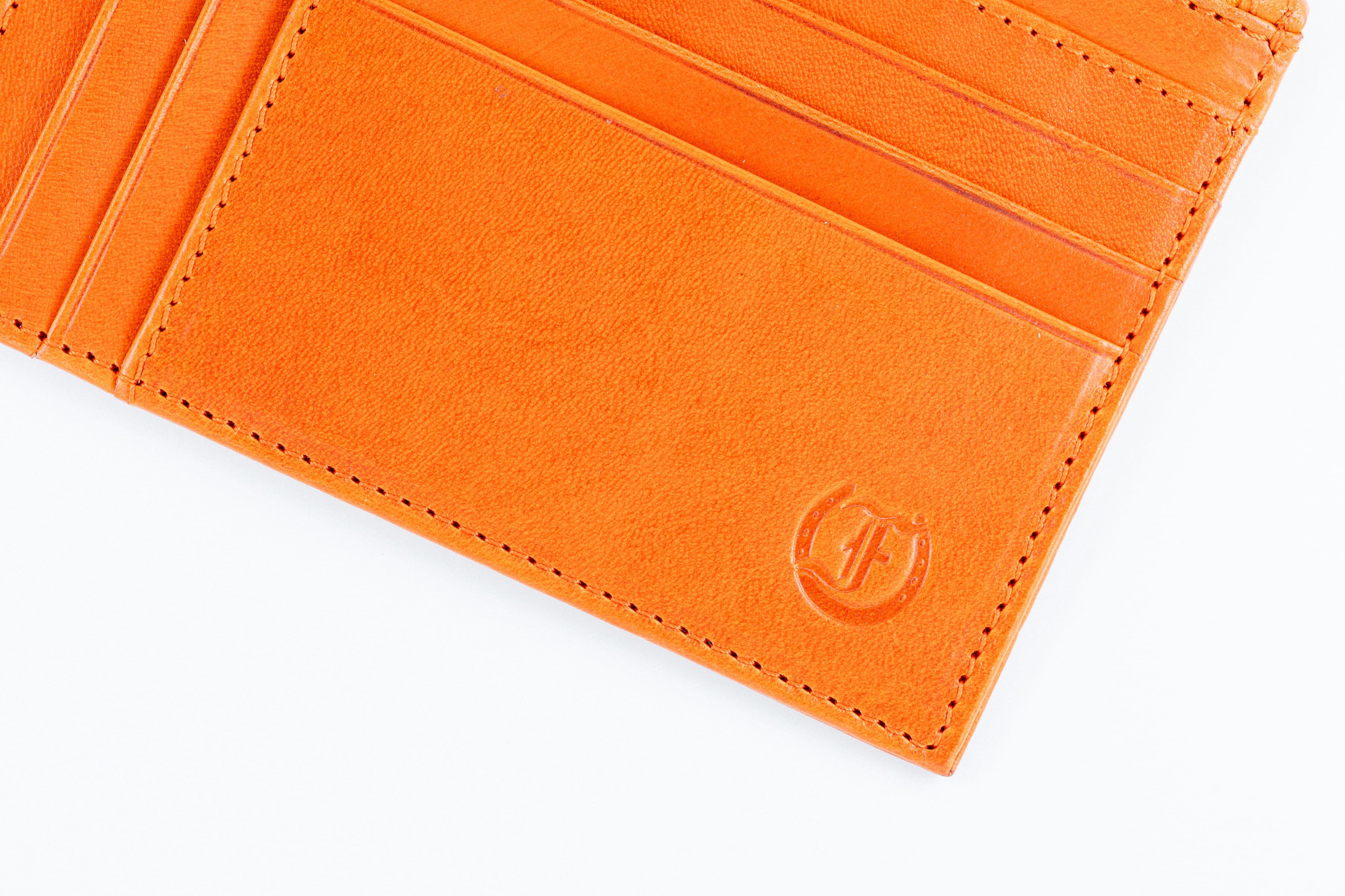 Freedman's Zip Top Wallet: Close-up of Interior Card Slots and Embossed Logo Detail