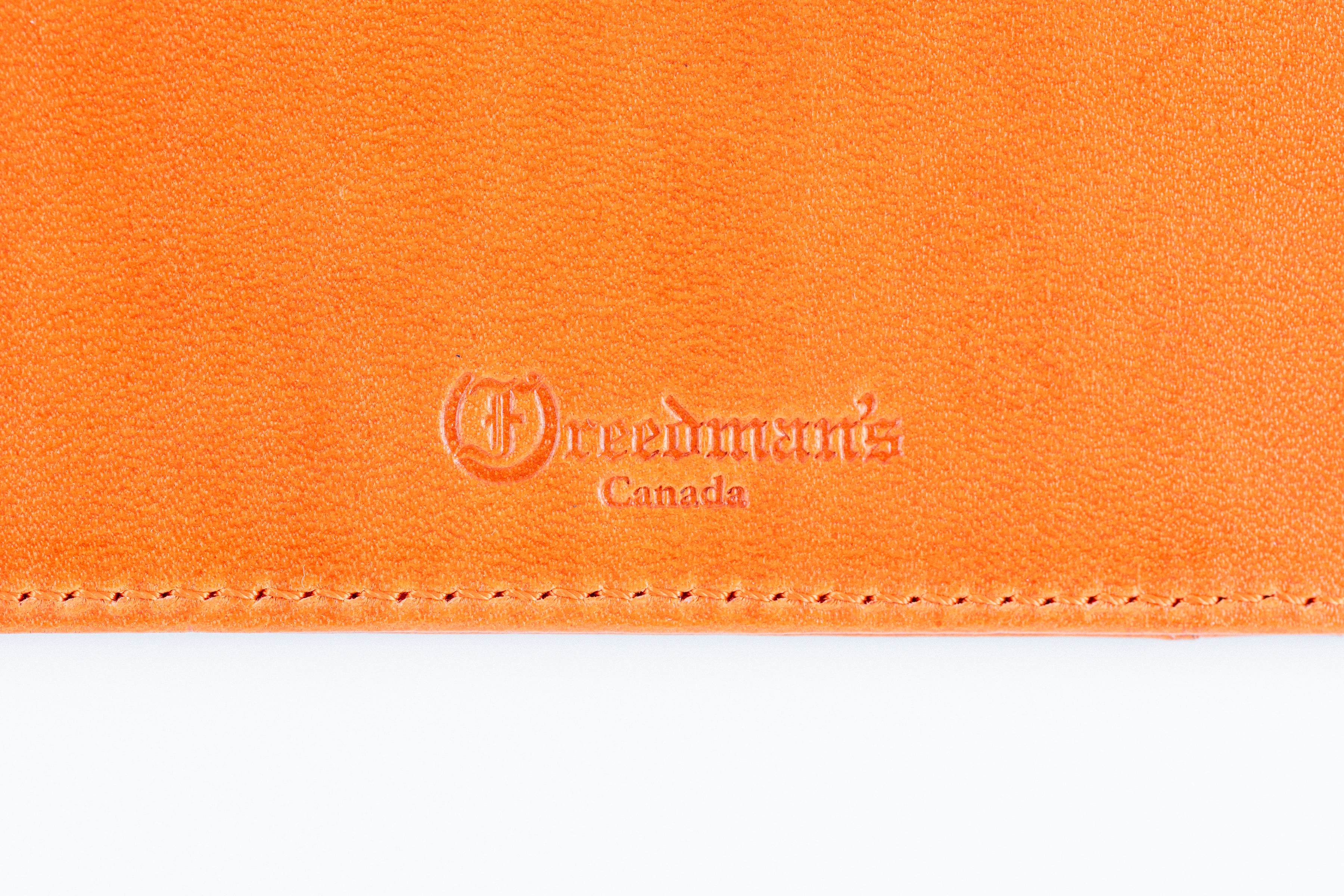 Close-up of Freedman's Logo and "Made in Canada" on Leather Wallet