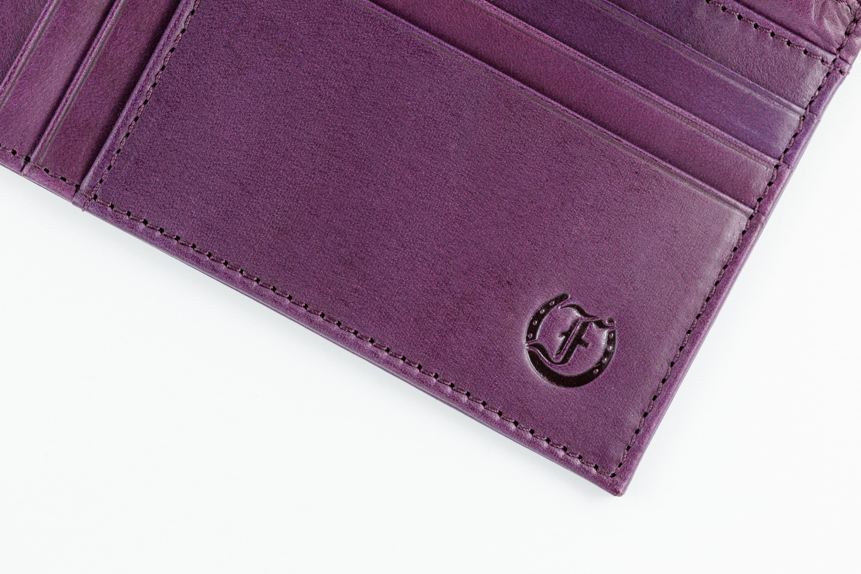 Freedman's Zip Top Wallet: Close-up of Interior Card Slots and Embossed Logo Detail