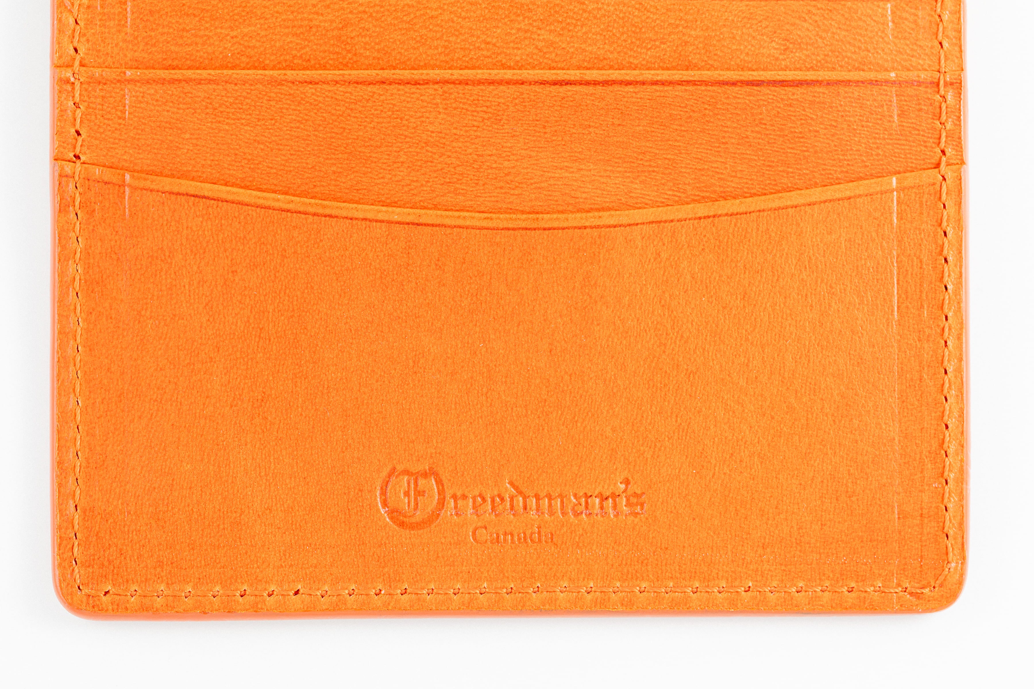 Freedman's Credit Card Holder: Interior View with Multiple Card Slots and Embossed Brand Logo - Orange