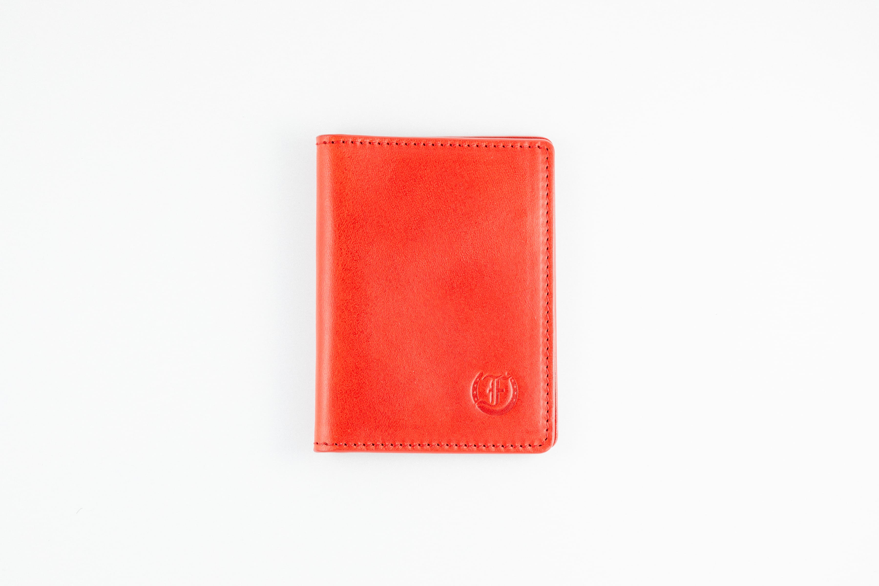 Freedman's Credit Card Holder: Slim and Durable Wallet, Close-Up on Leather Texture and Stitching- Red