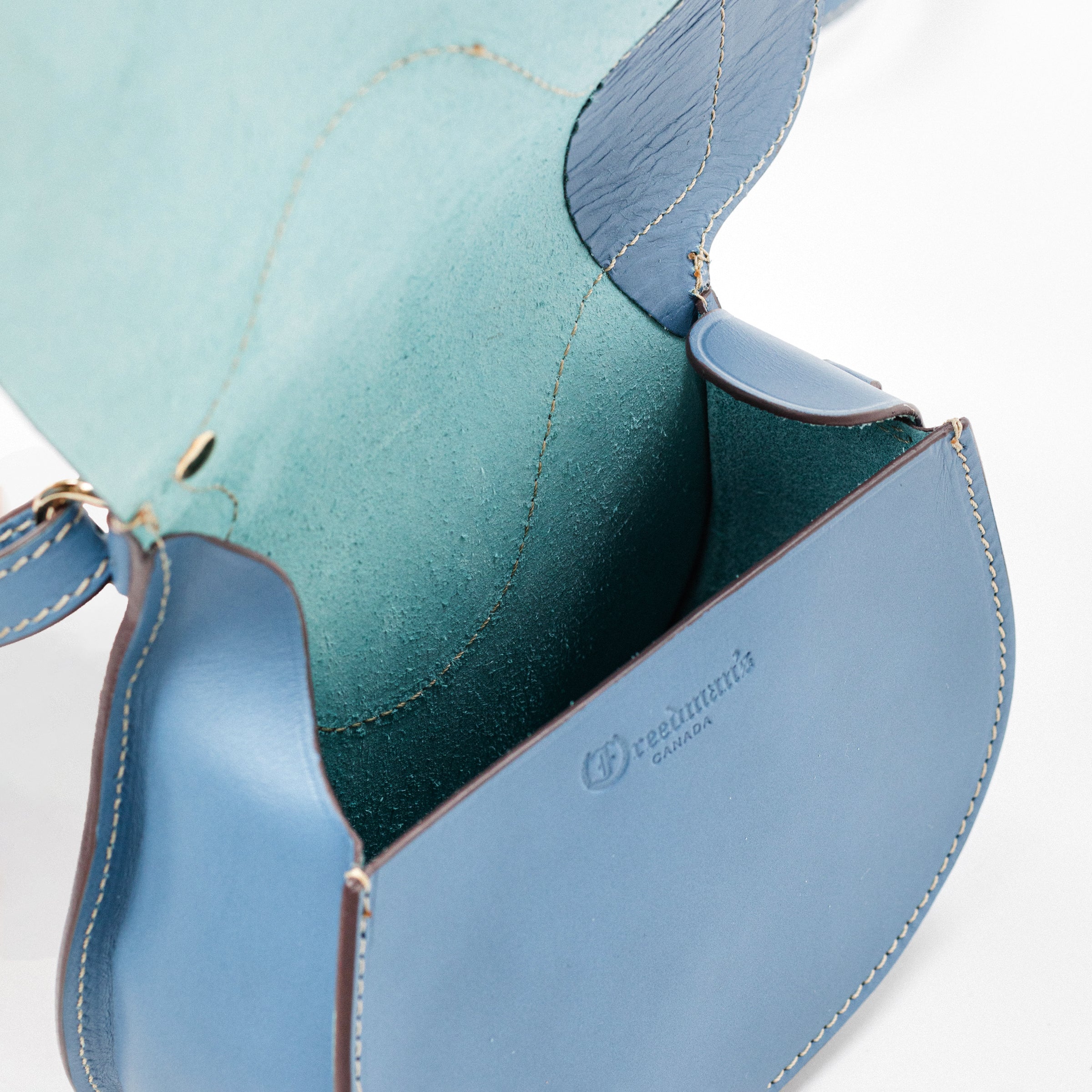 Freedman's Derby Shoulder Bag: Close-up of Open Interior with Brand Logo and Material Detail