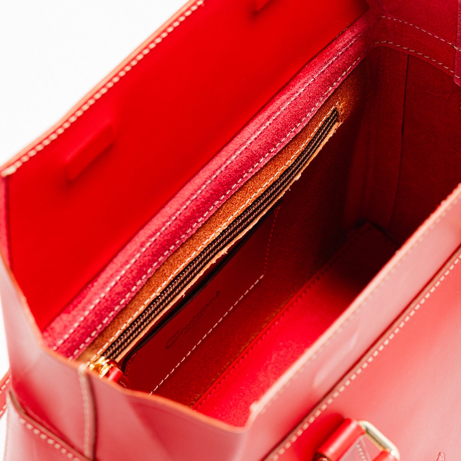 Freedman's Dormeuse Bag: Red Leather Handbag with Top Handle and Gold Hardware