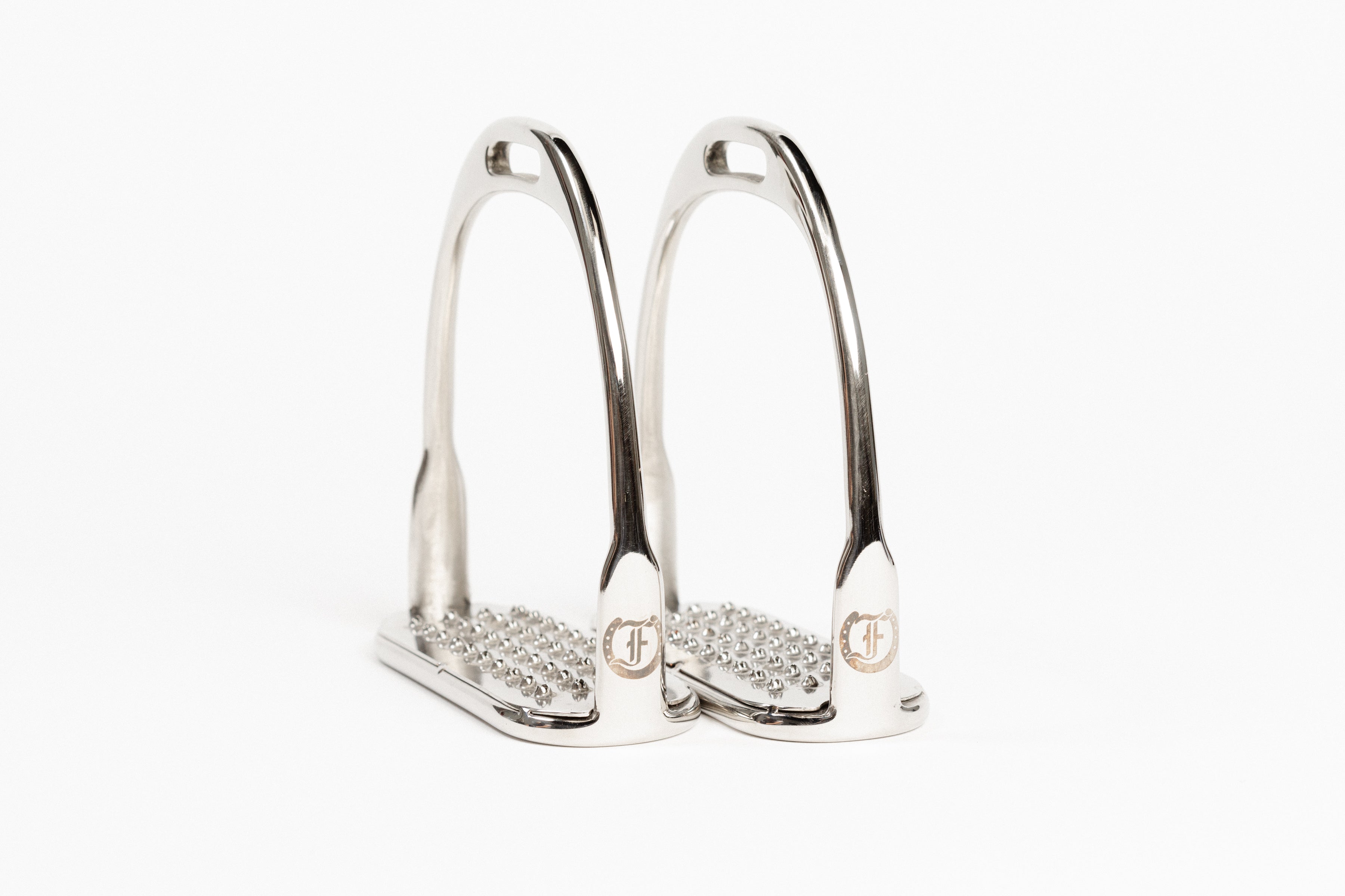 Pair of Freedman's Logo Hunter Stirrup Irons with permanent pick stainless steel treads and visible Freedman's "F" logo.