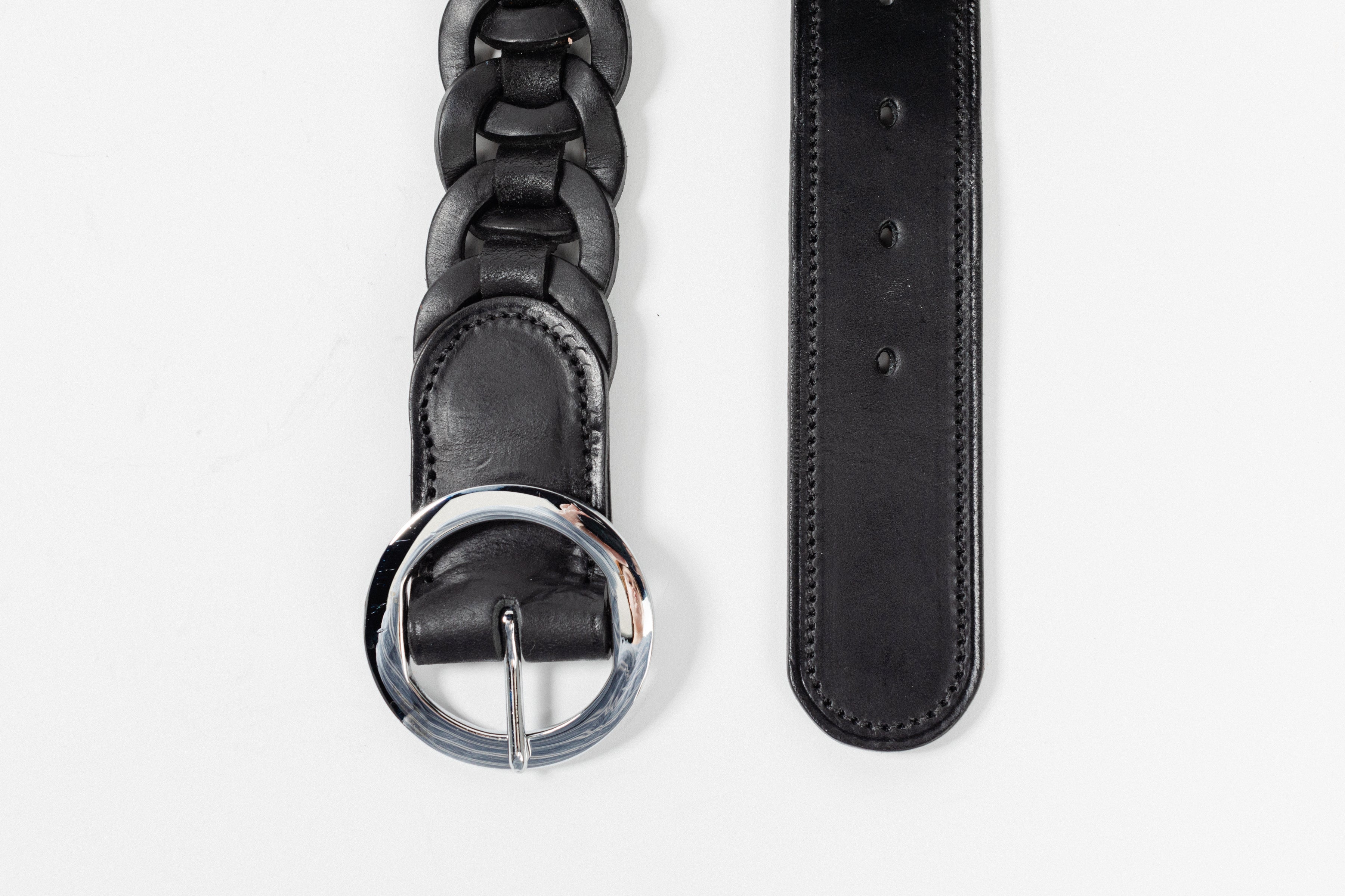Close-up of black leather Small Leather Ring Belt by Freedman's showing braided detail, silver ring buckle, and belt loop, on a white background.