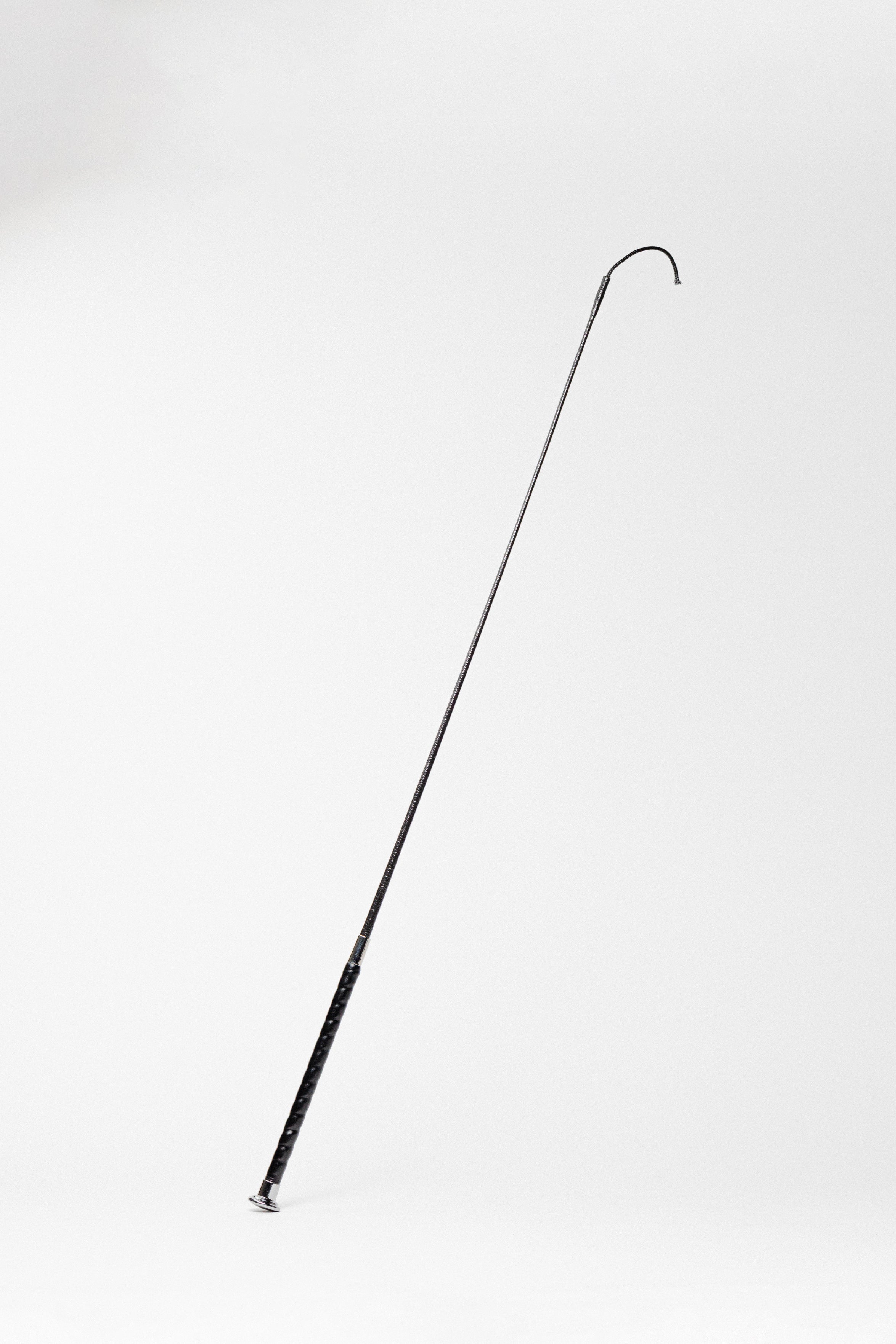 Show Crop with black textured leather wrap handle, silver cap, and curved tip