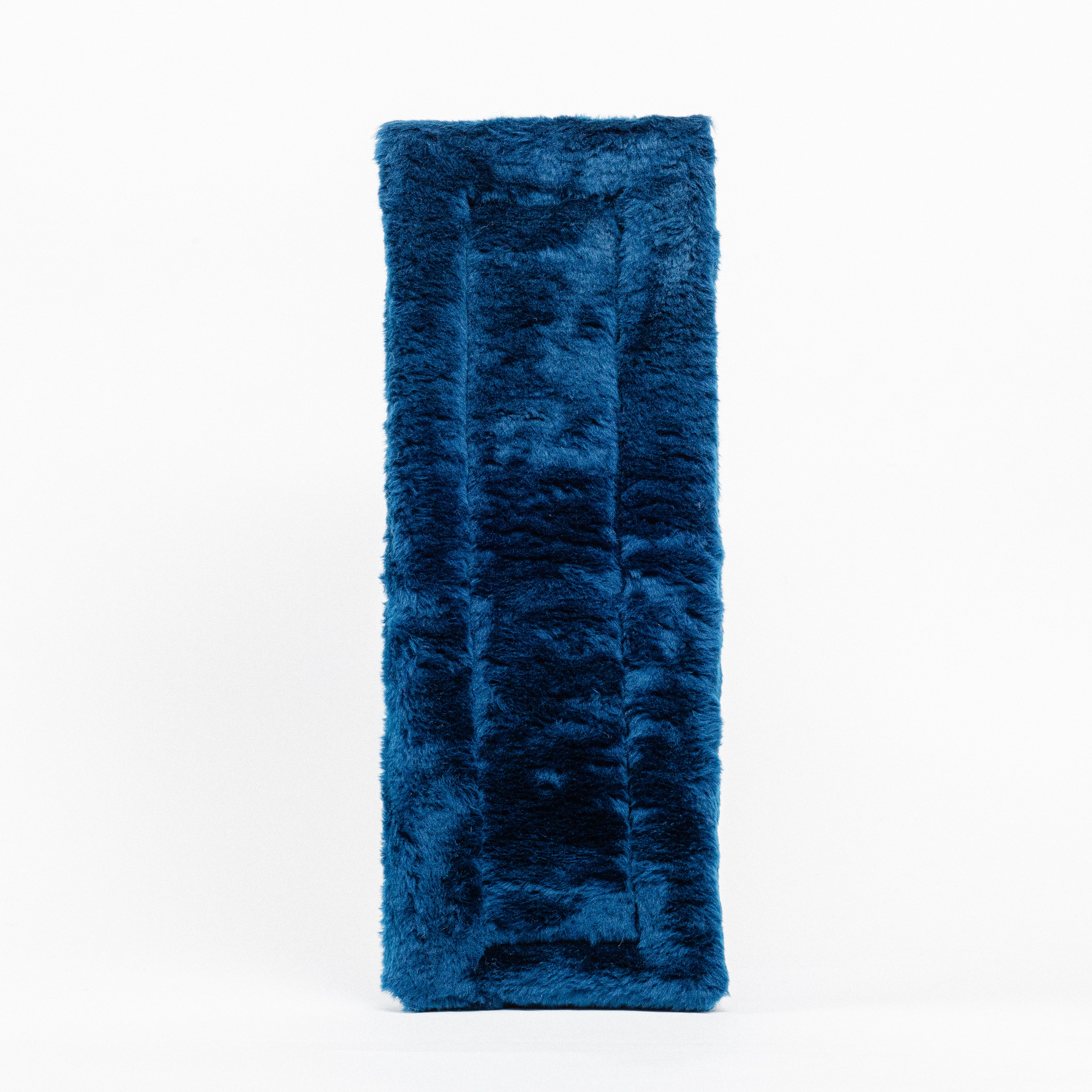 Black Fleece Back Pad by Freedman's, front-view of textured blue fabric