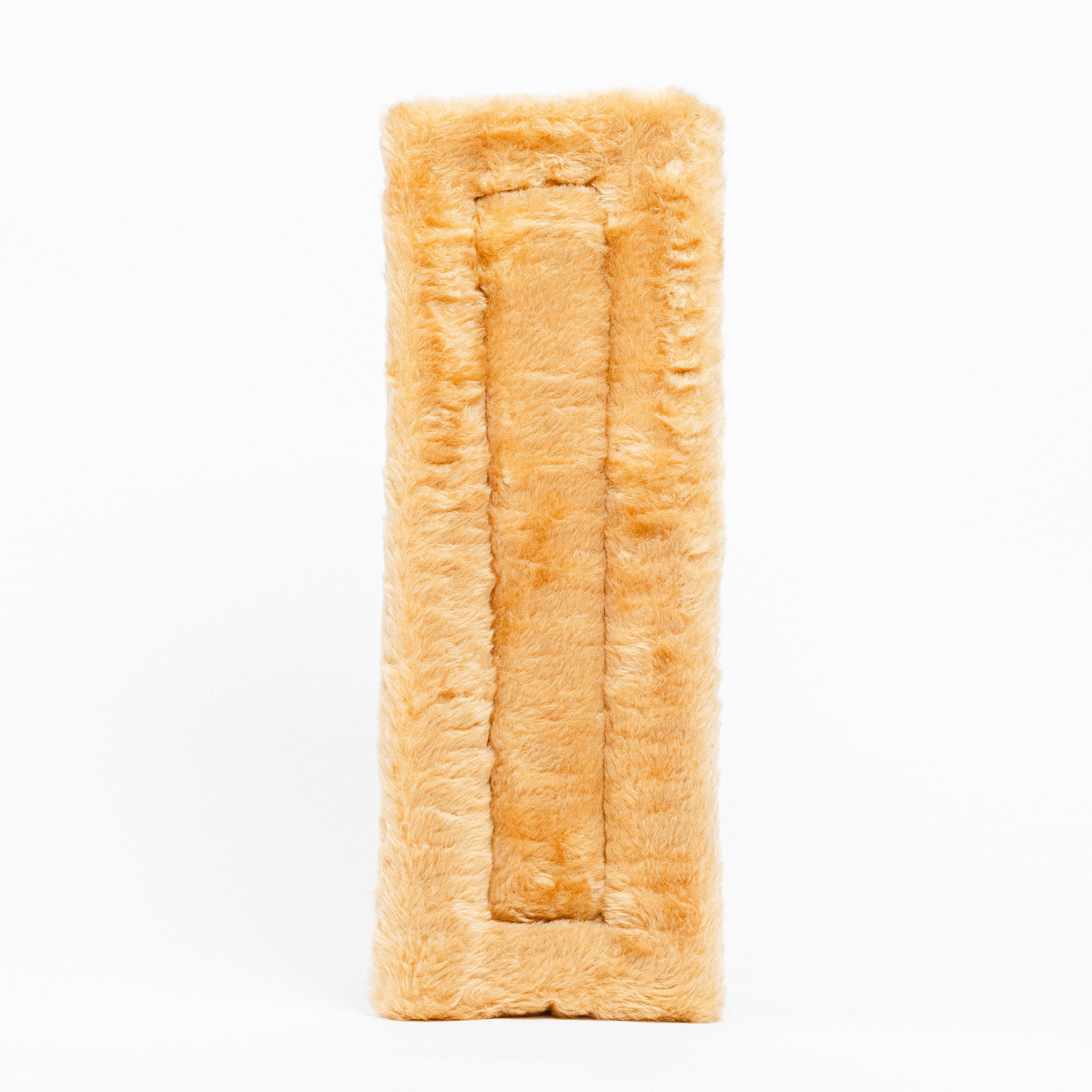 Black Fleece Back Pad by Freedman's, front-view of textured tan fabric