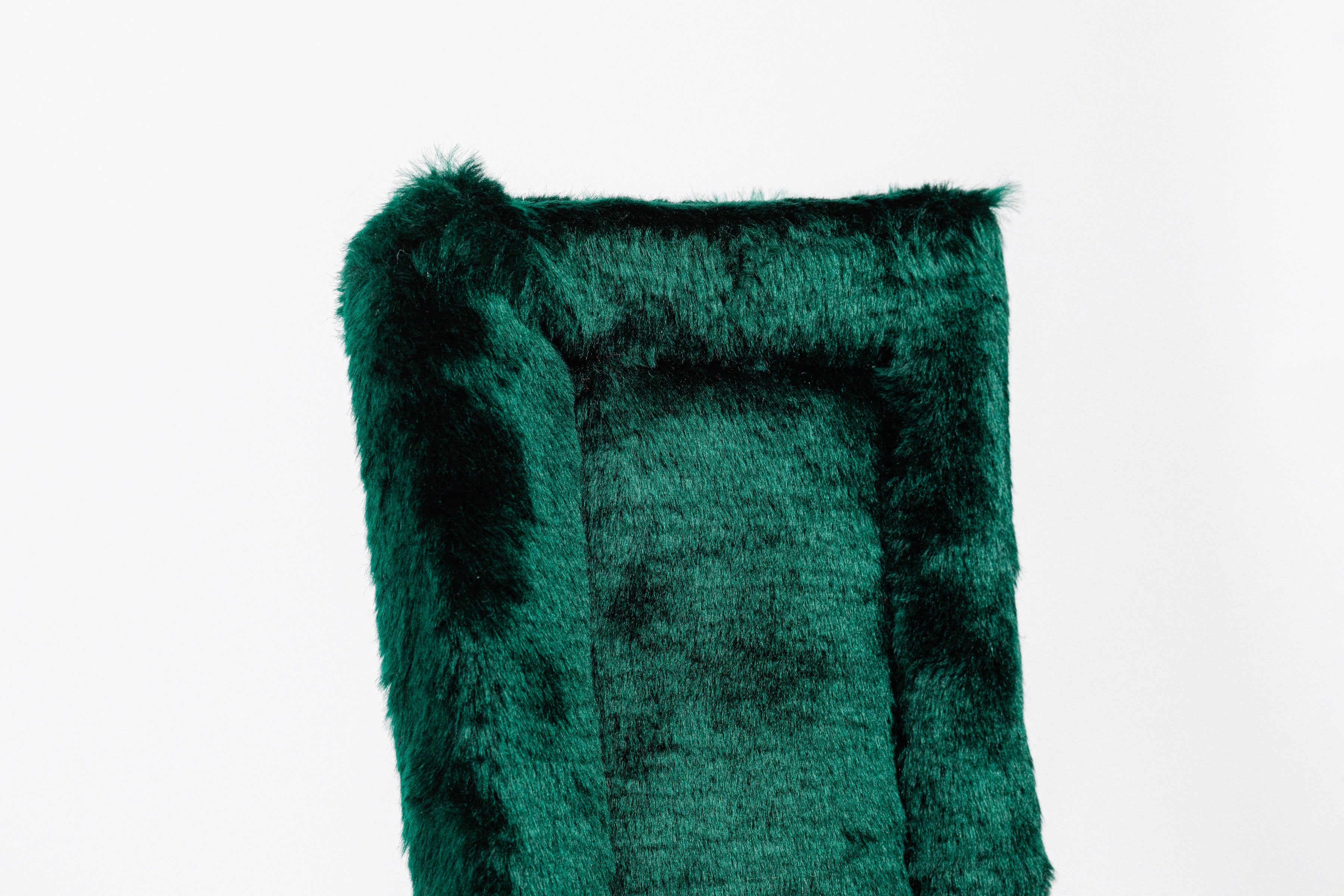 Black Fleece Back Pad by Freedman's, close-up of textured dark green fabric"