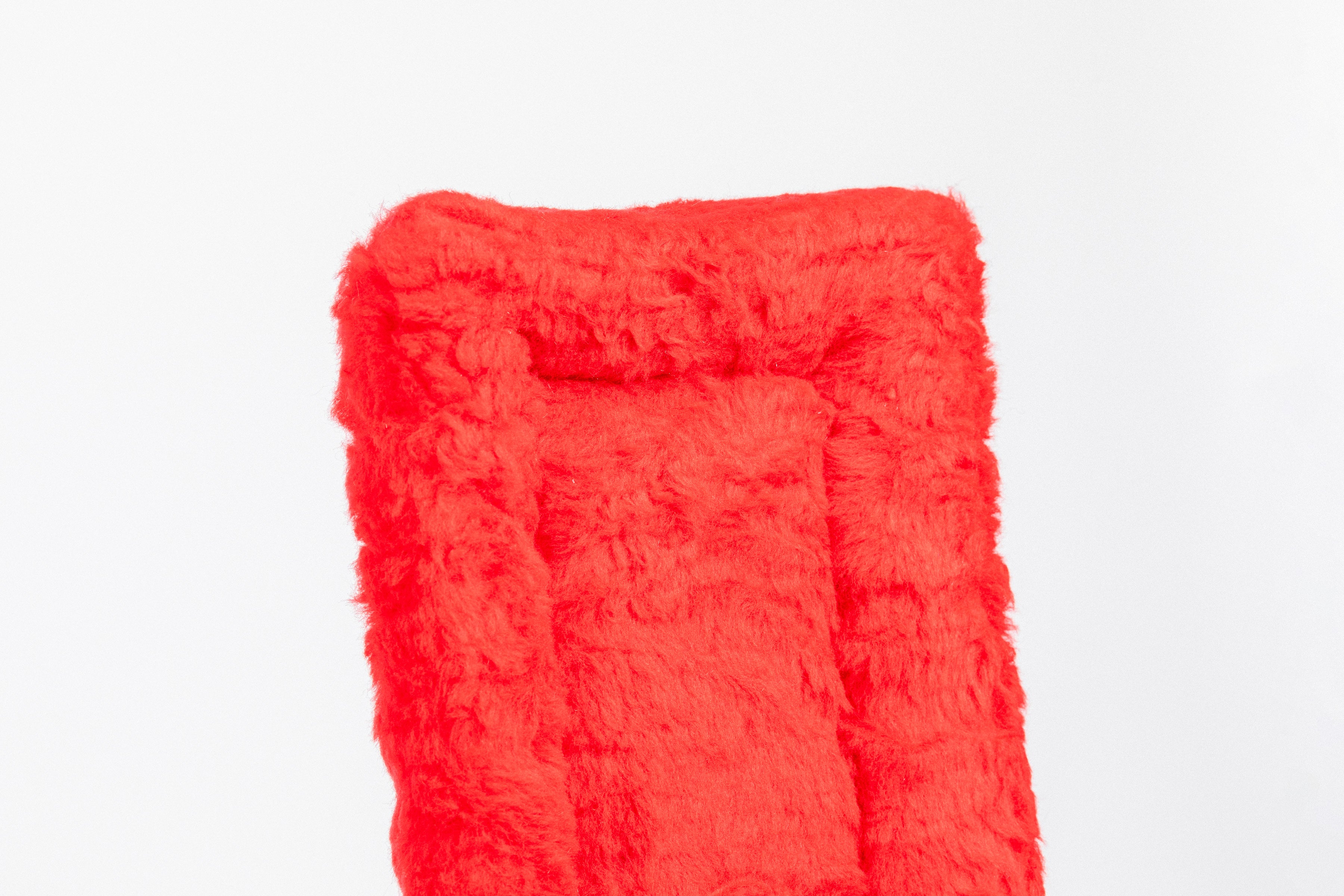 Black Fleece Back Pad by Freedman's, close-up of textured red fabric