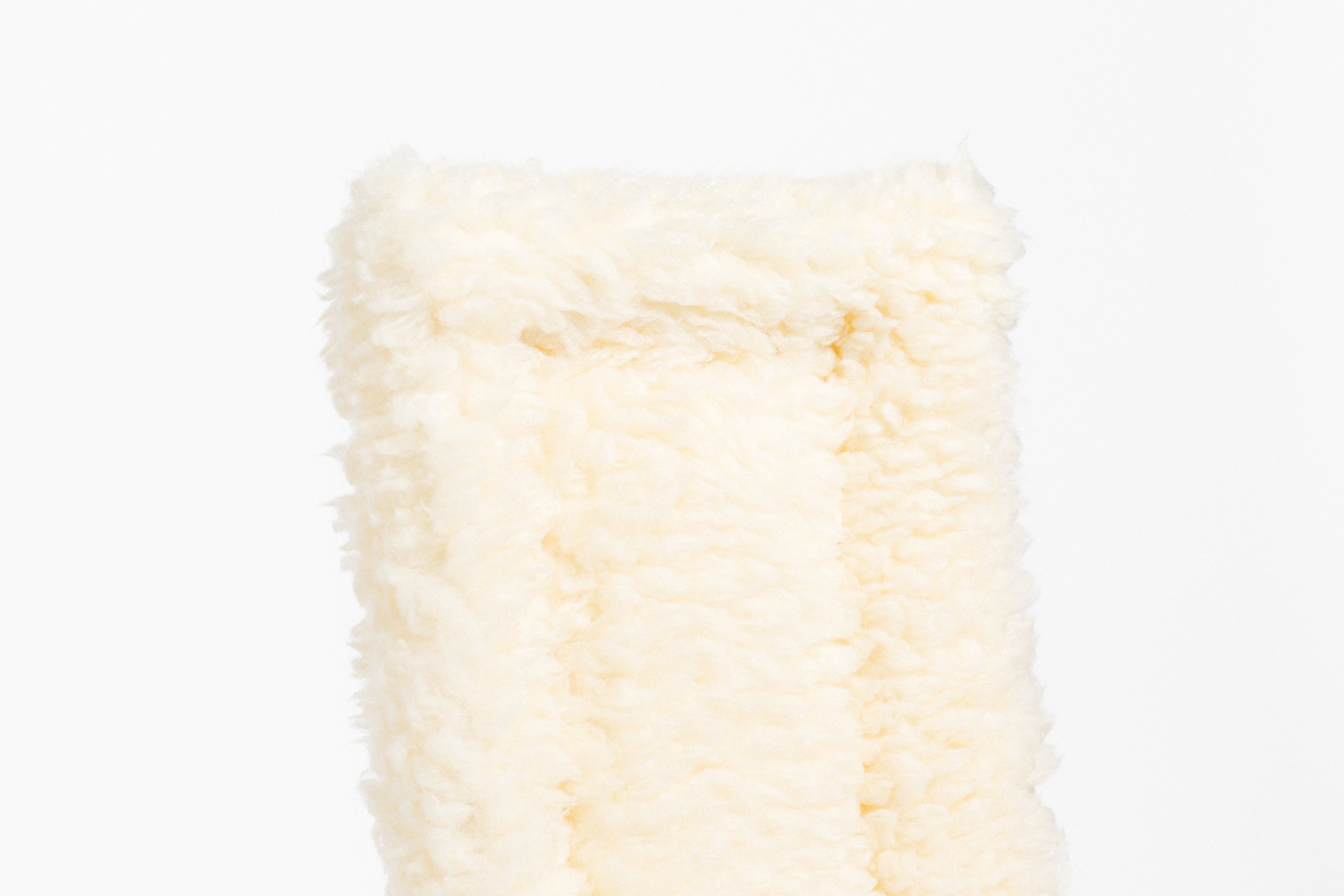 Black Fleece Back Pad by Freedman's, close-up of textured natural fabric