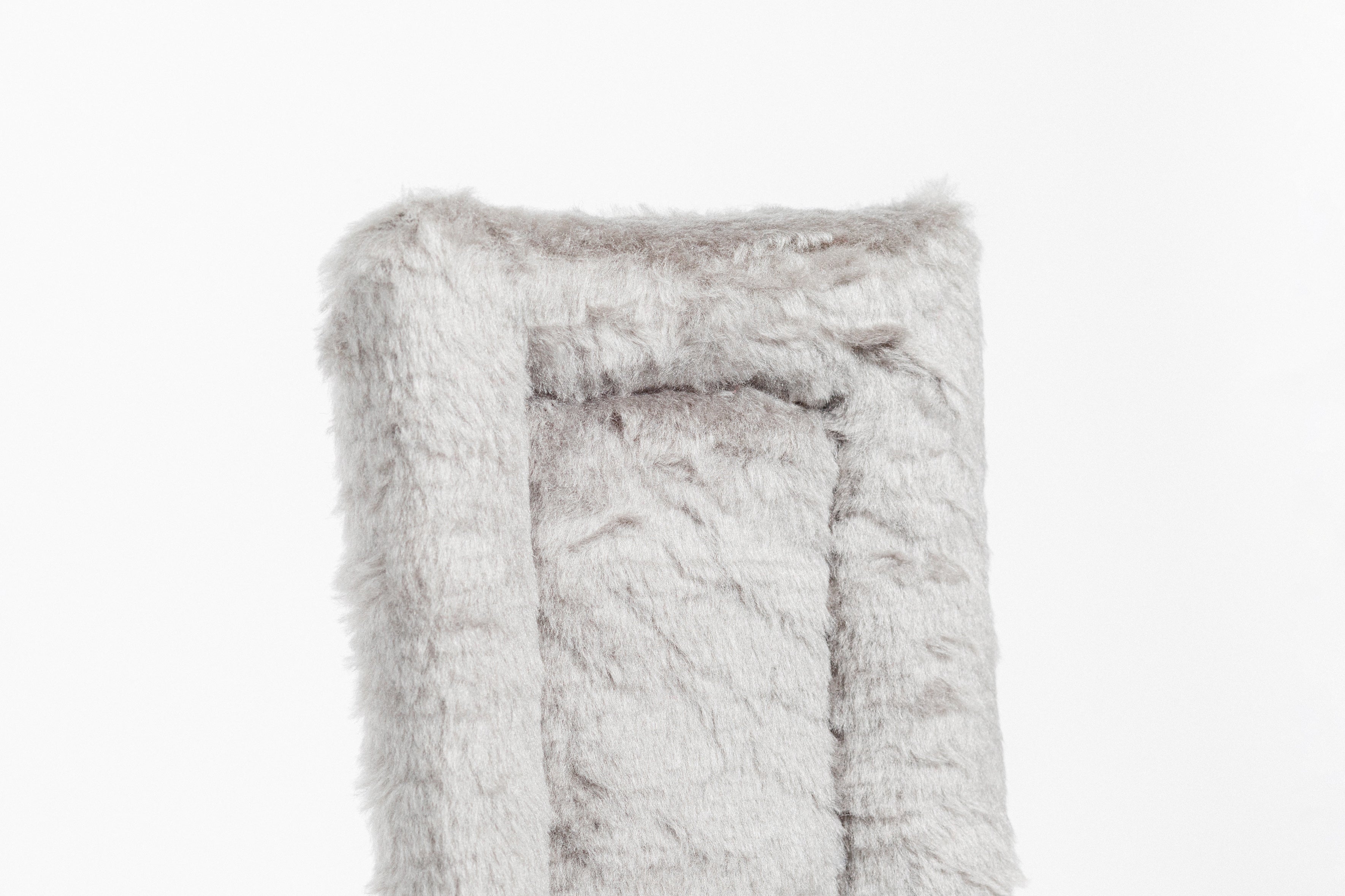 Black Fleece Back Pad by Freedman's, close-up of textured grey  fabric