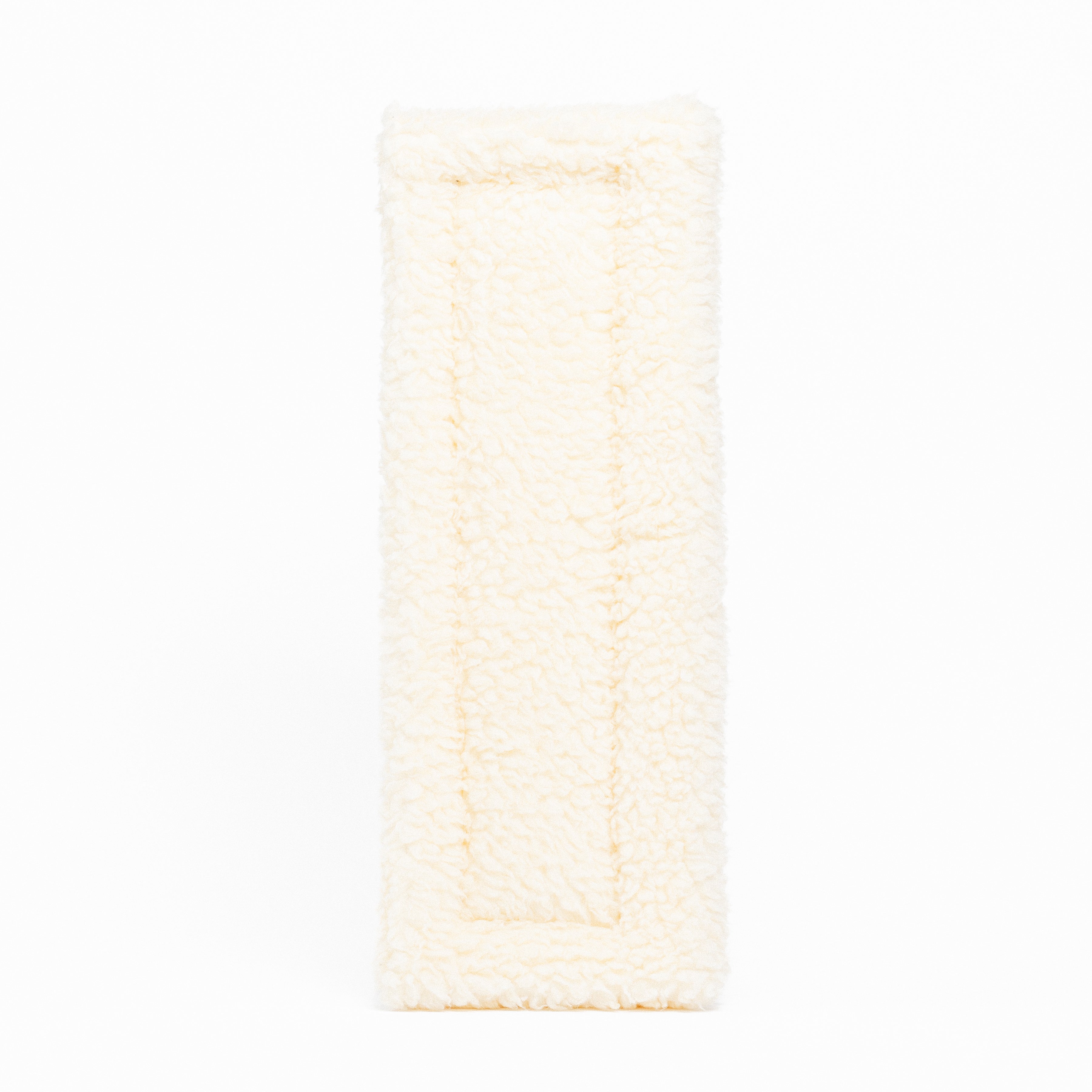 Black Fleece Back Pad by Freedman's, front-view of textured natural fabric