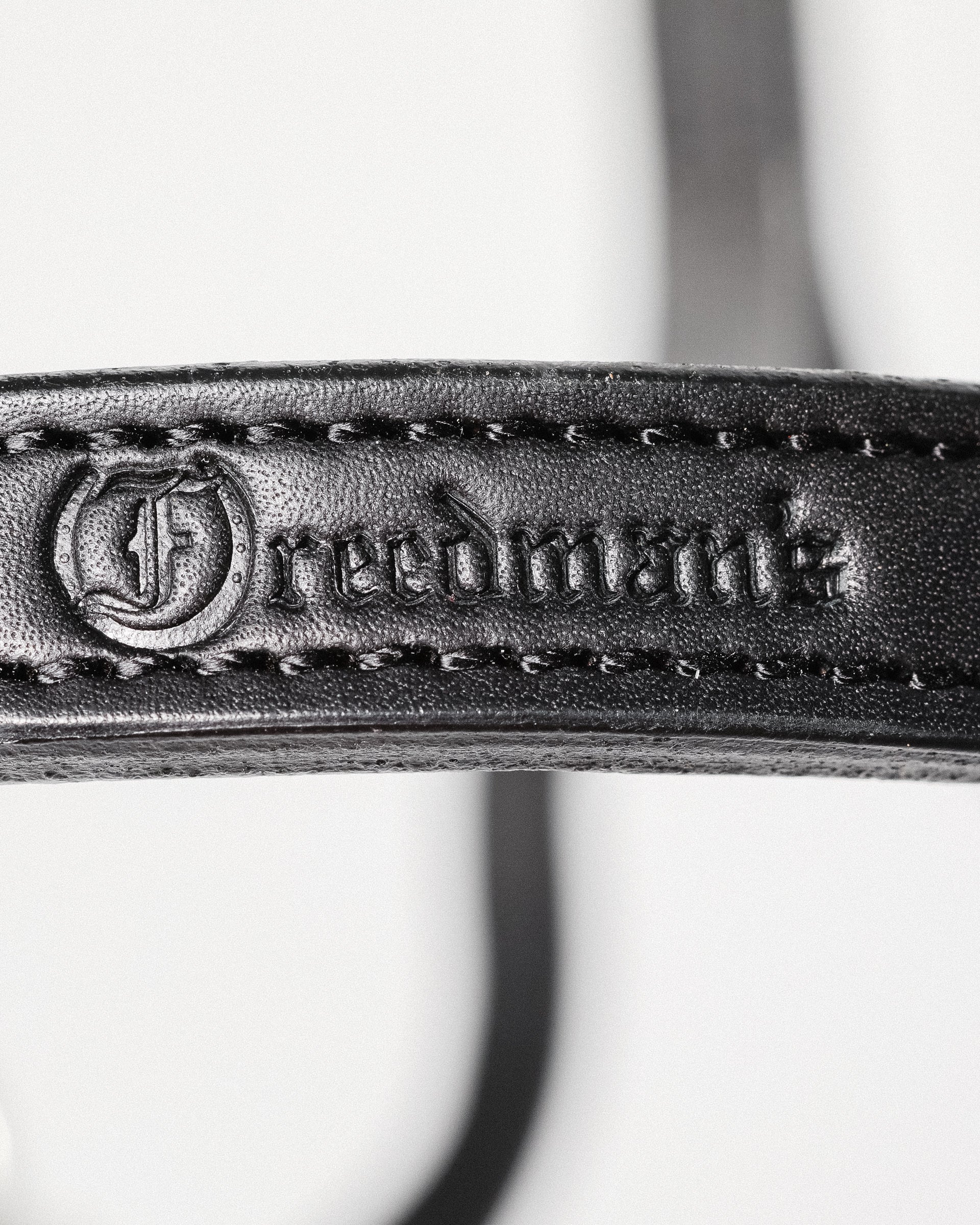 close-up of Freedman's Brand Logo on Black Leather Horse Halter