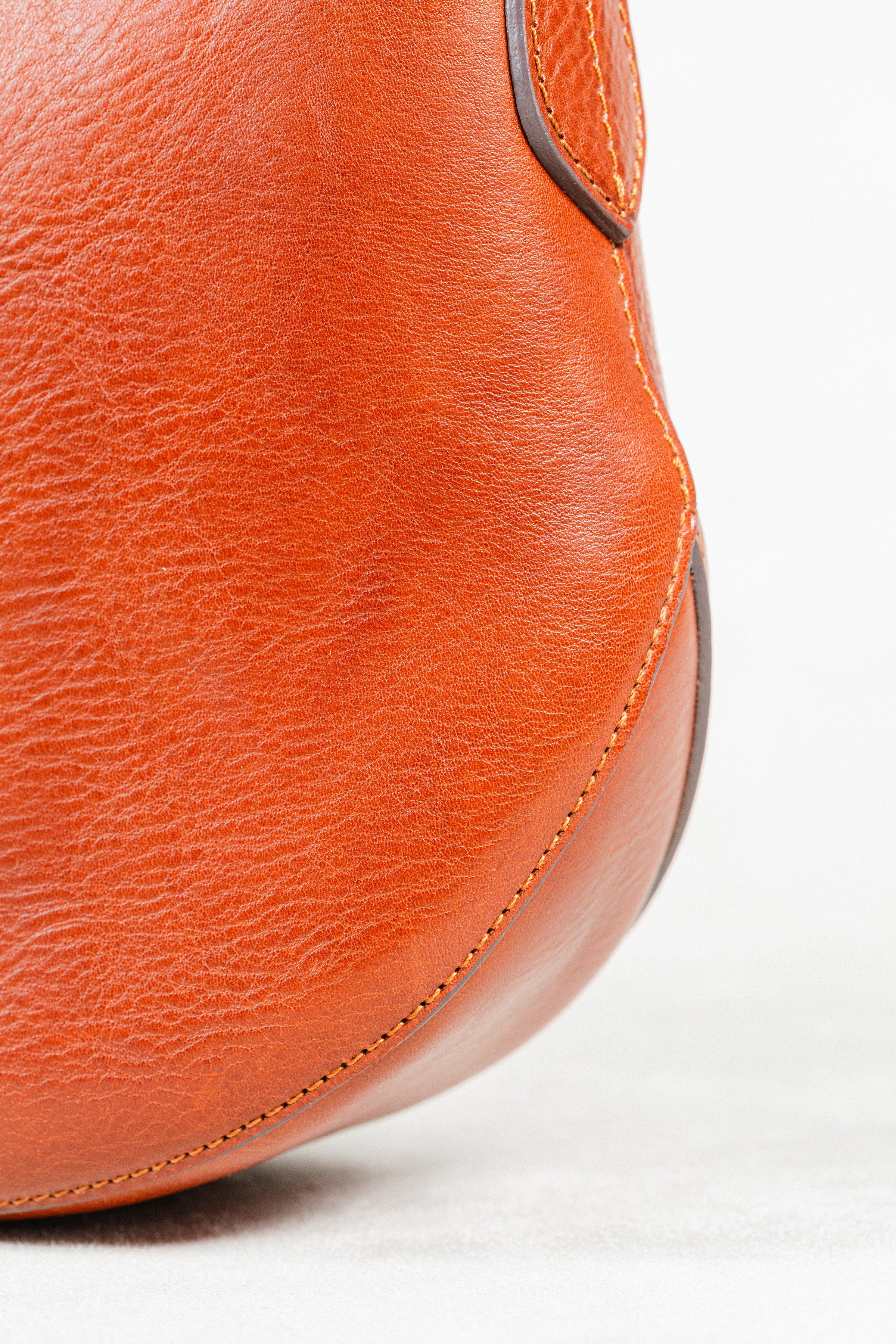 Chestnut Leather Detail of Freedman's Murphy Bag, Showing Grain and Hand-Stitched Seam