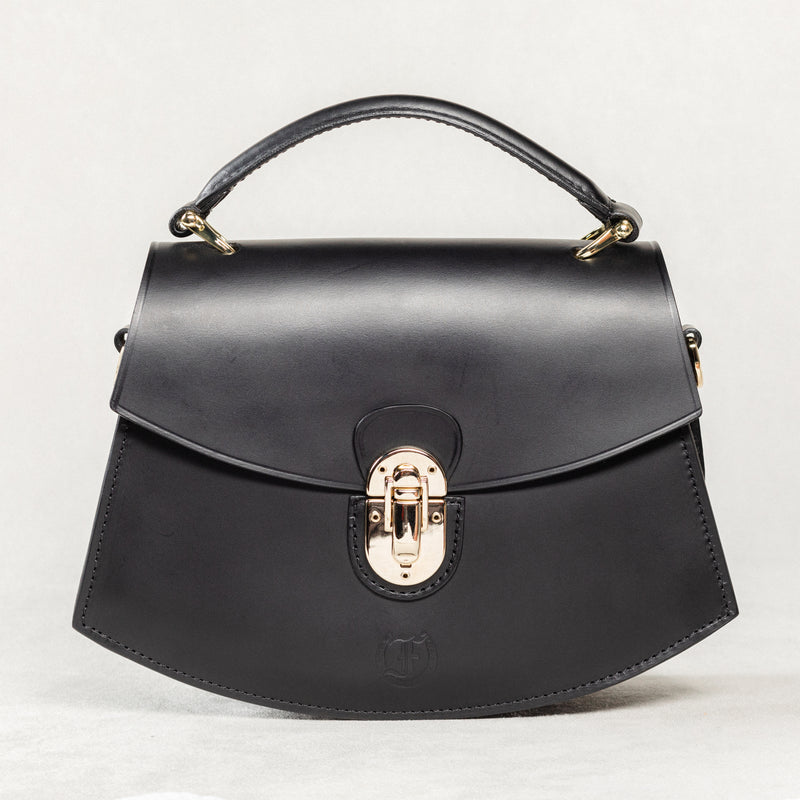 Black leather Minibus Bag by Freedman's with structured top handle and gold-tone hardware.