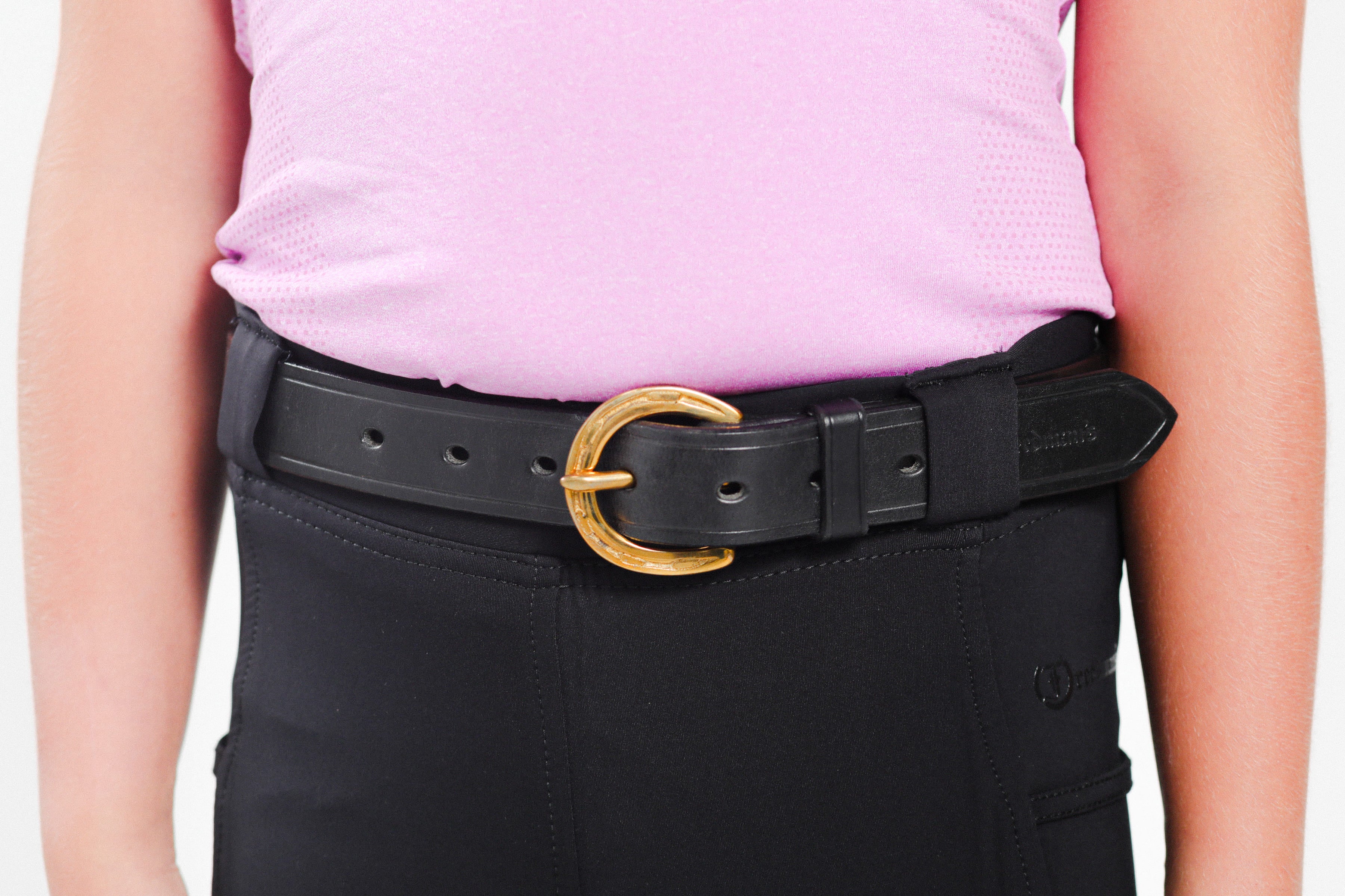 Close up view of the Kid's Horseshoe Buckle Belt showcasing the solid brass horse shoe buckle