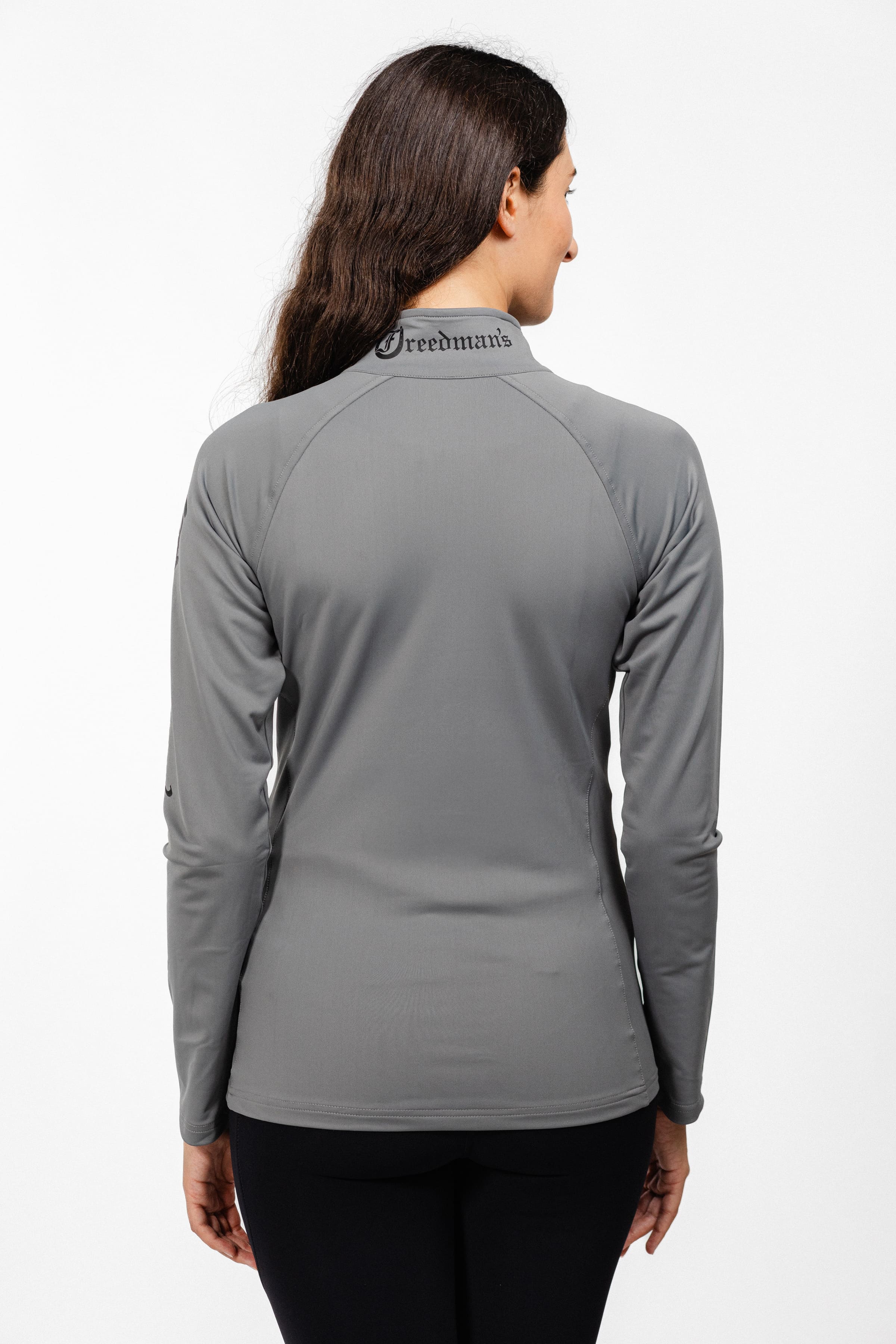 Back View of Model Wearing Gray Freedman's Ladies Arum Jacket and Freedman's Print Collar, showcasing athletic fit