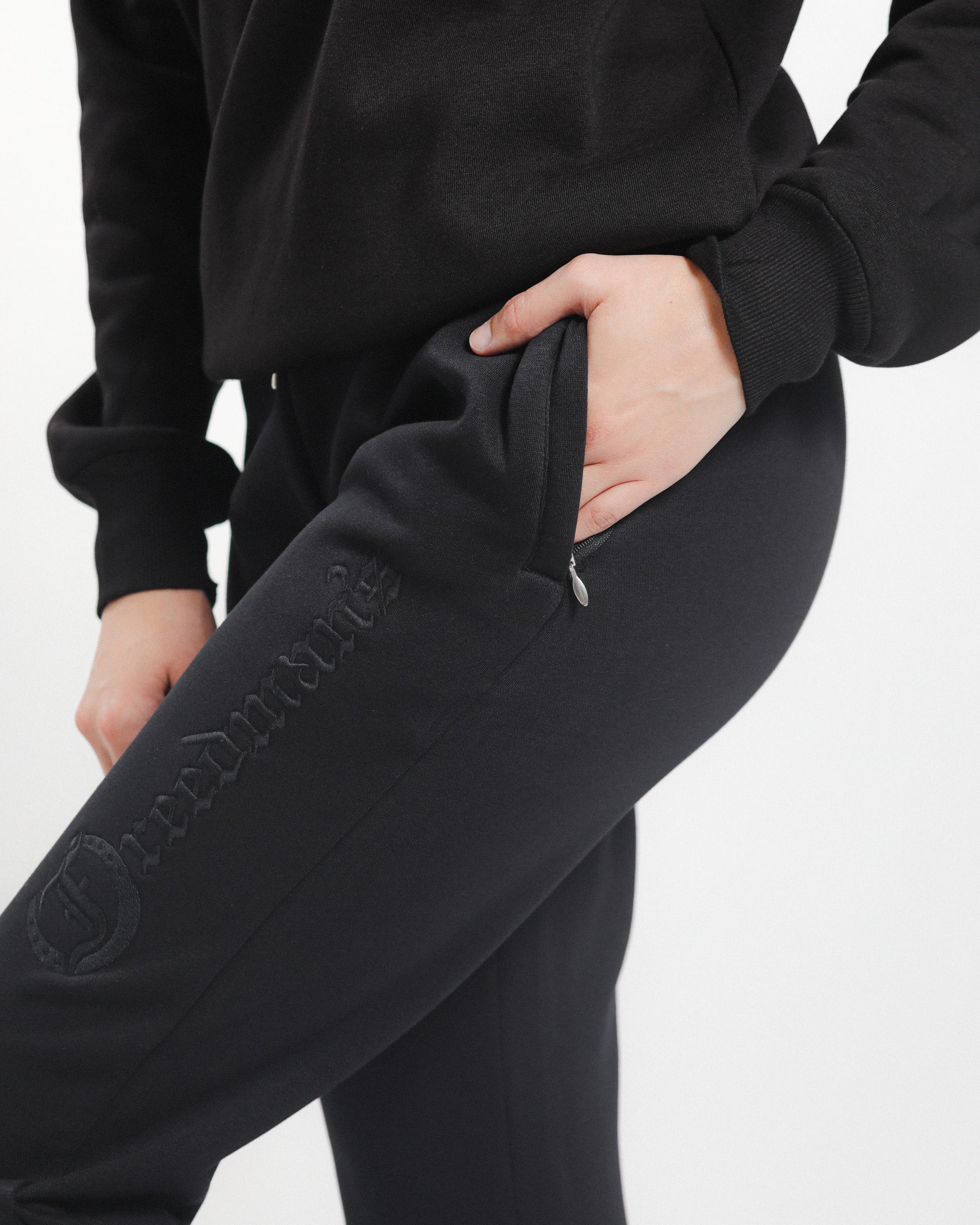 Close-up of Freedman's Ladies' Joggers Showing Brand Logo- side view