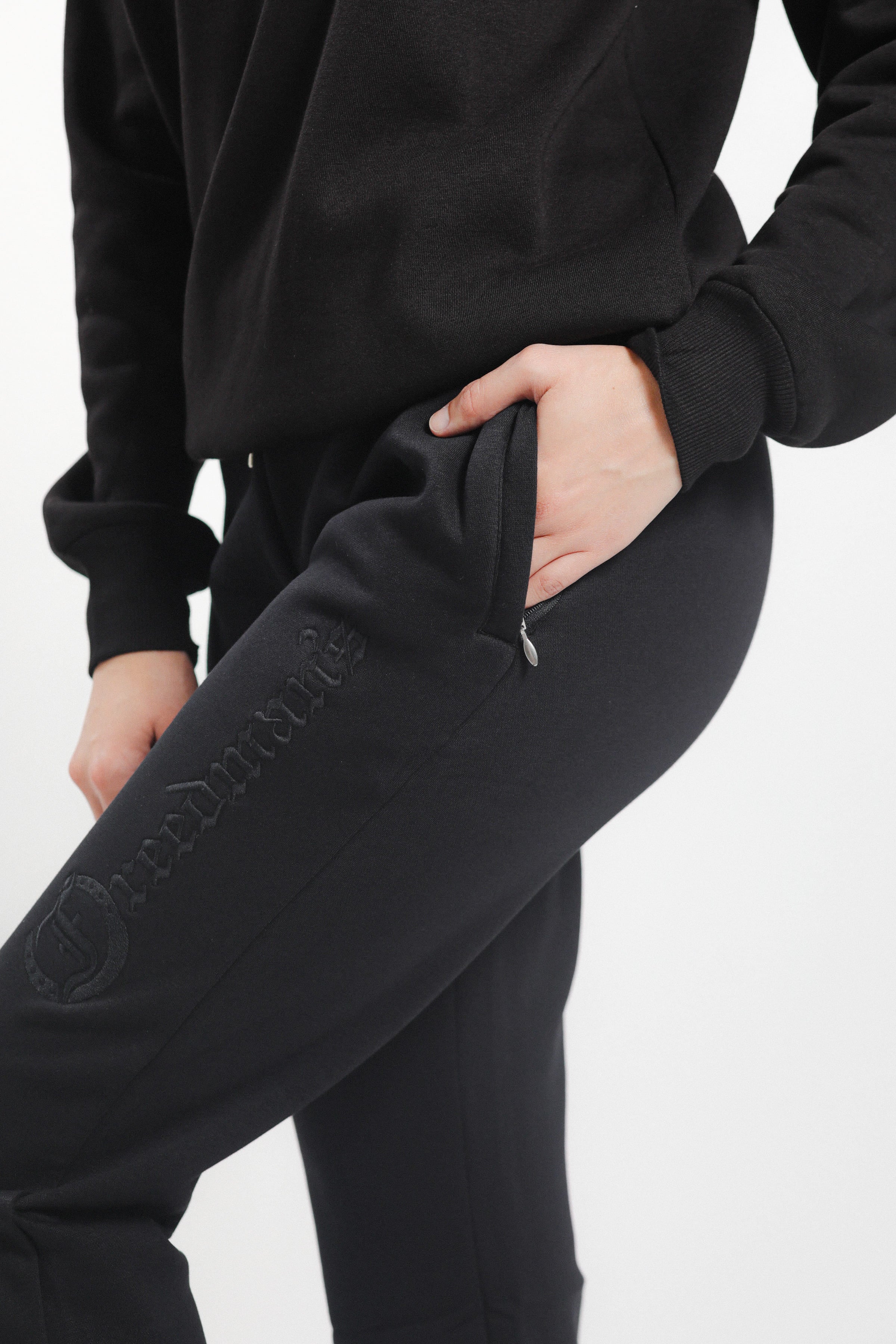 Close-up of Freedman's Ladies' Joggers Showing Brand Logo- side view