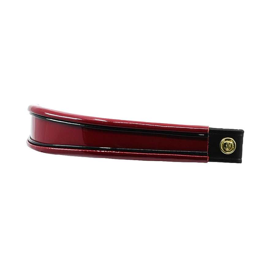 Red and black insert patent leather browband, wide tapered design, turned edge, side view showing leather end and button detail.