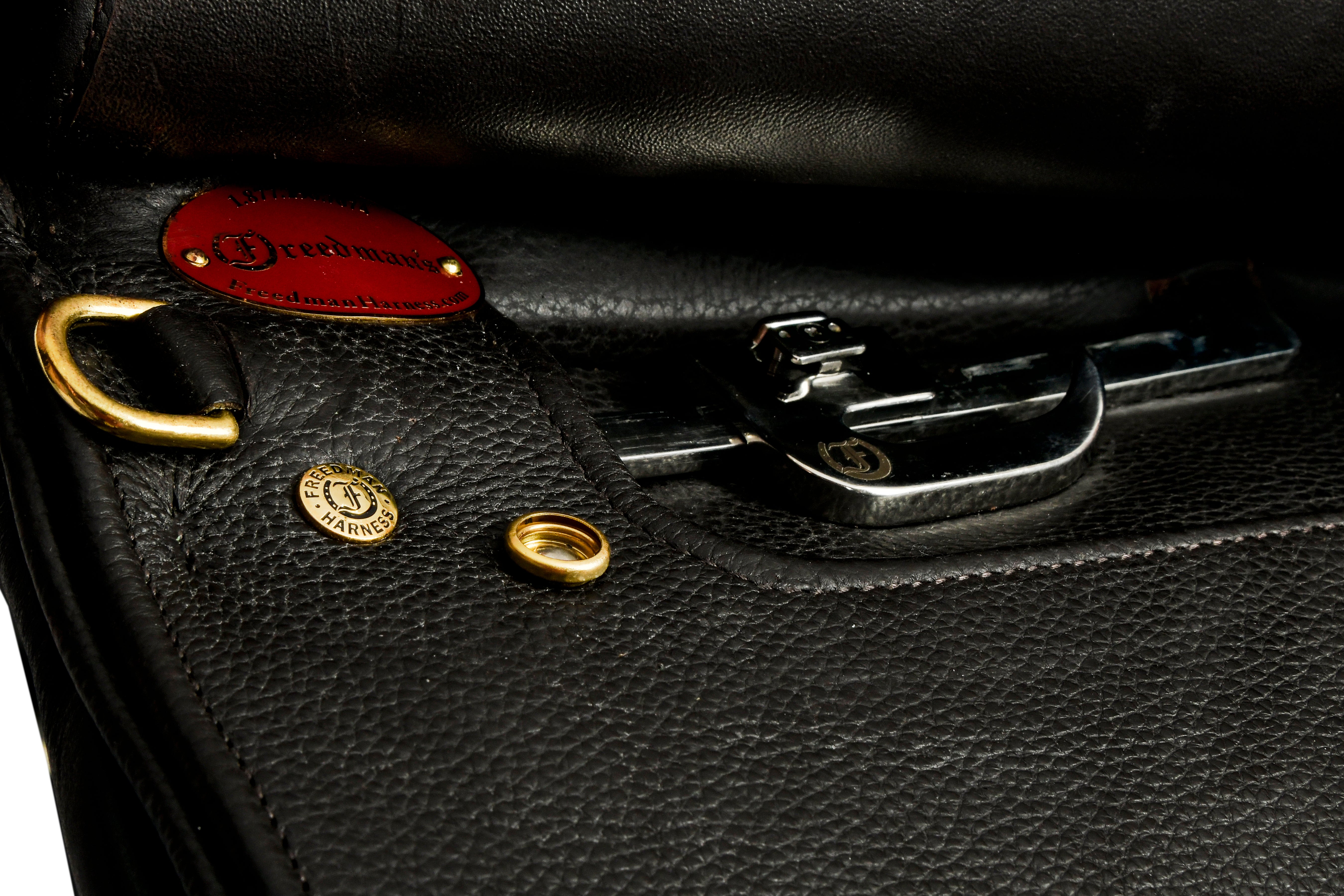Close-up of the inside of a World Cup HP Cutback Saddle showing the hardware and branding.