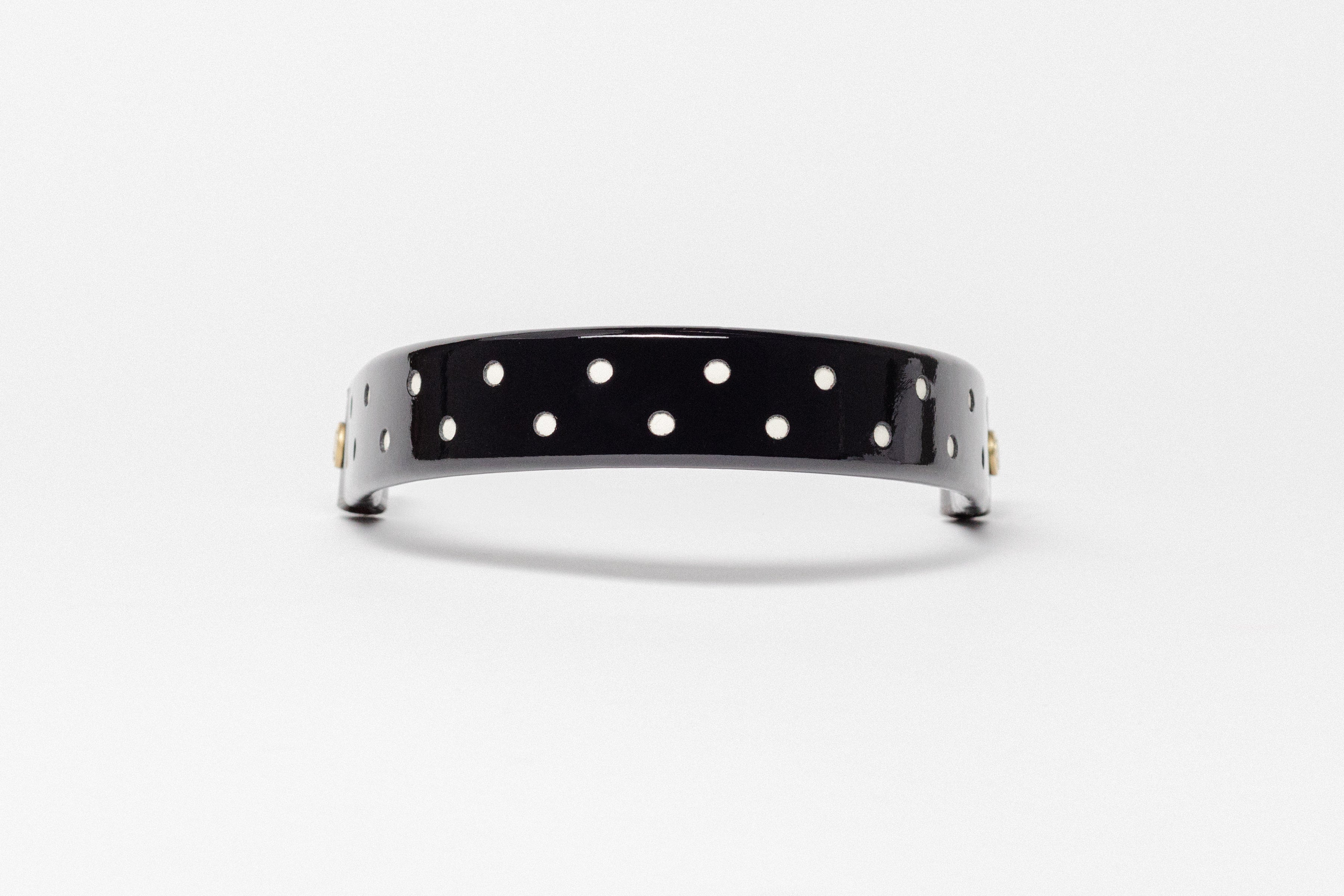 Wide Tapered turned edge browband, black patent, small white dots, brown ends.