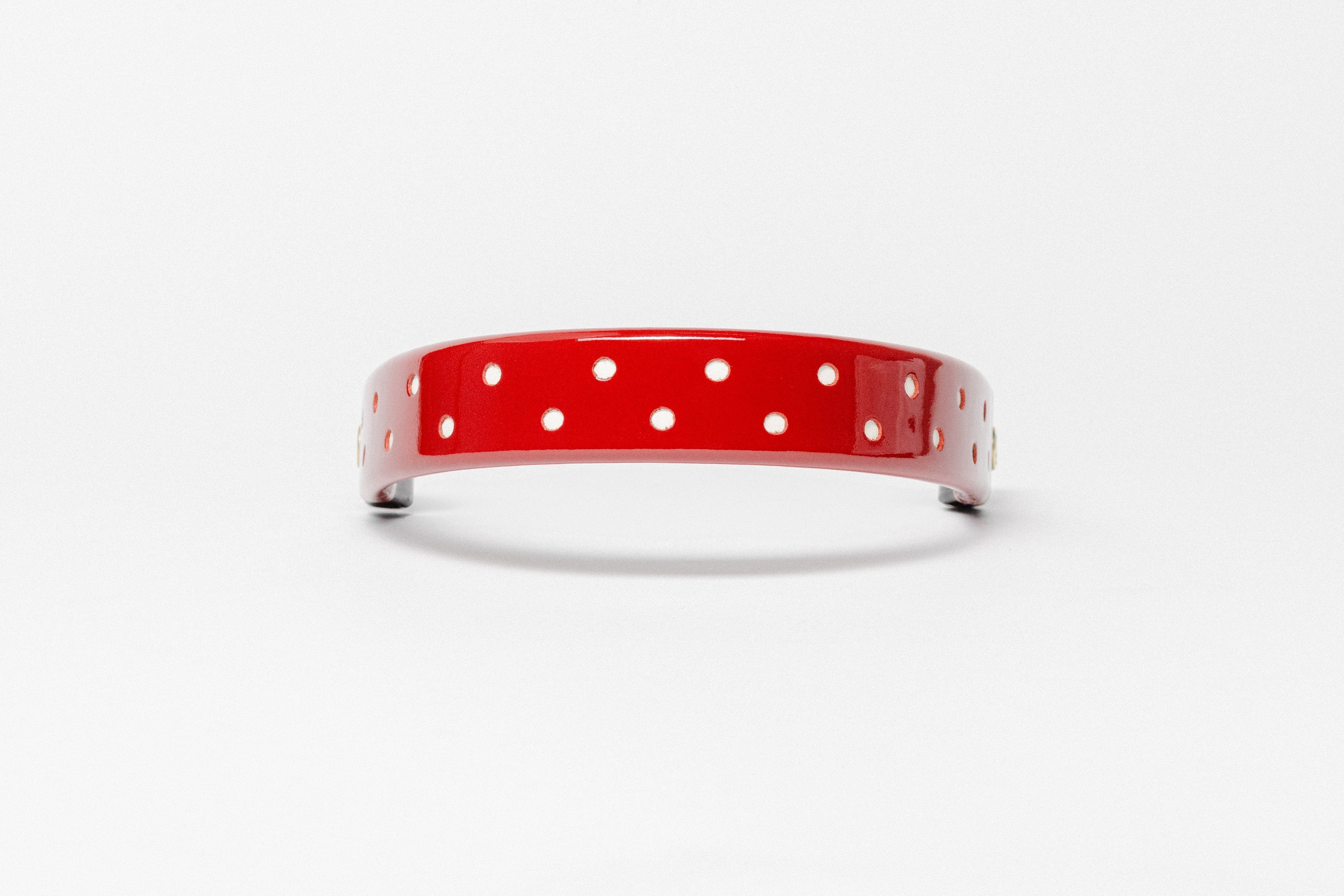 Wide Tapered turned edge browband, red patent, small white dots, brown ends.