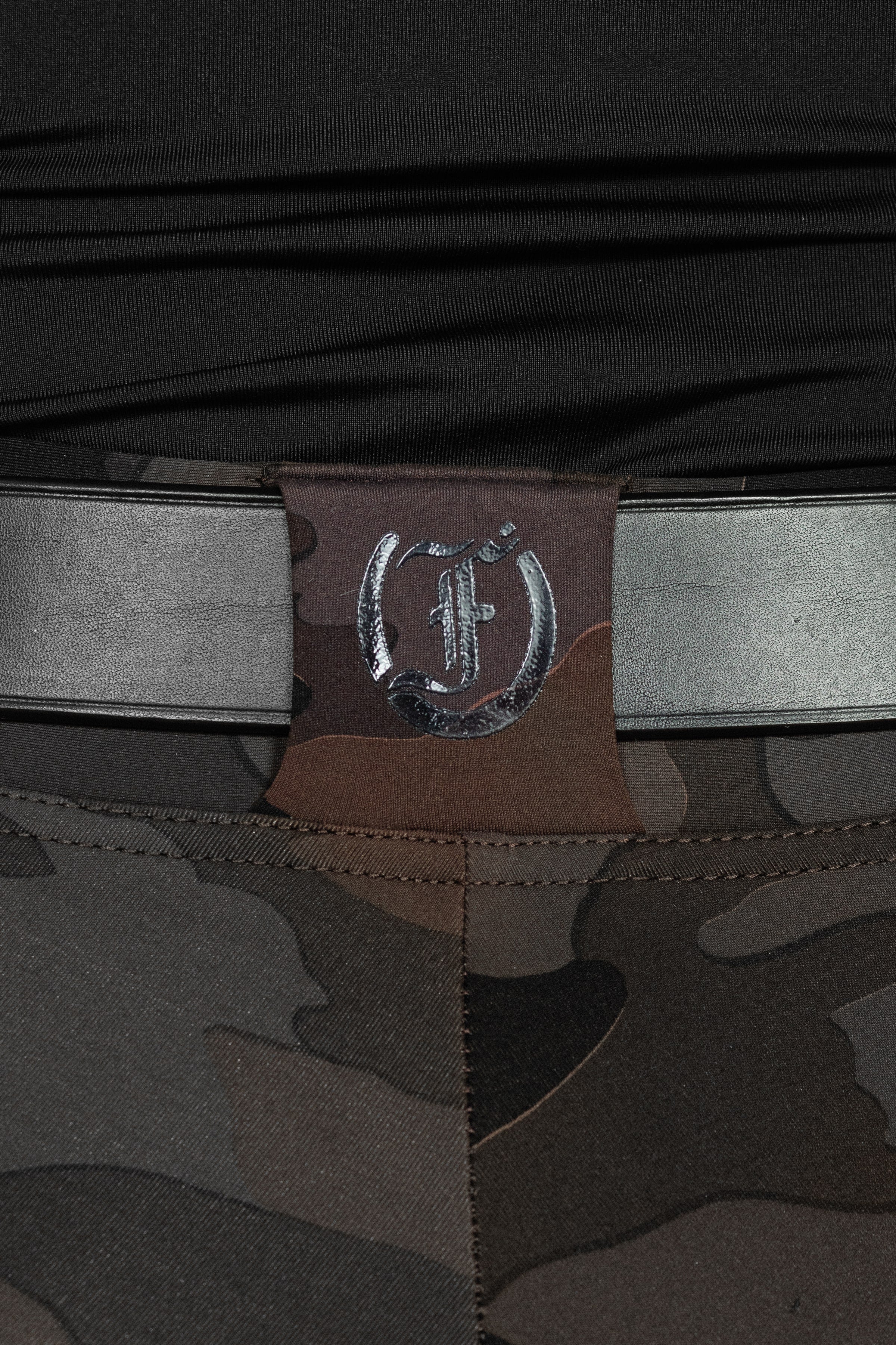 Stylish Tous les Jours Jods - Burgundy Camo by Freedman's – sleek, comfortable, and perfect for equestrian fashion. Close up Freedman's logo on the belt.