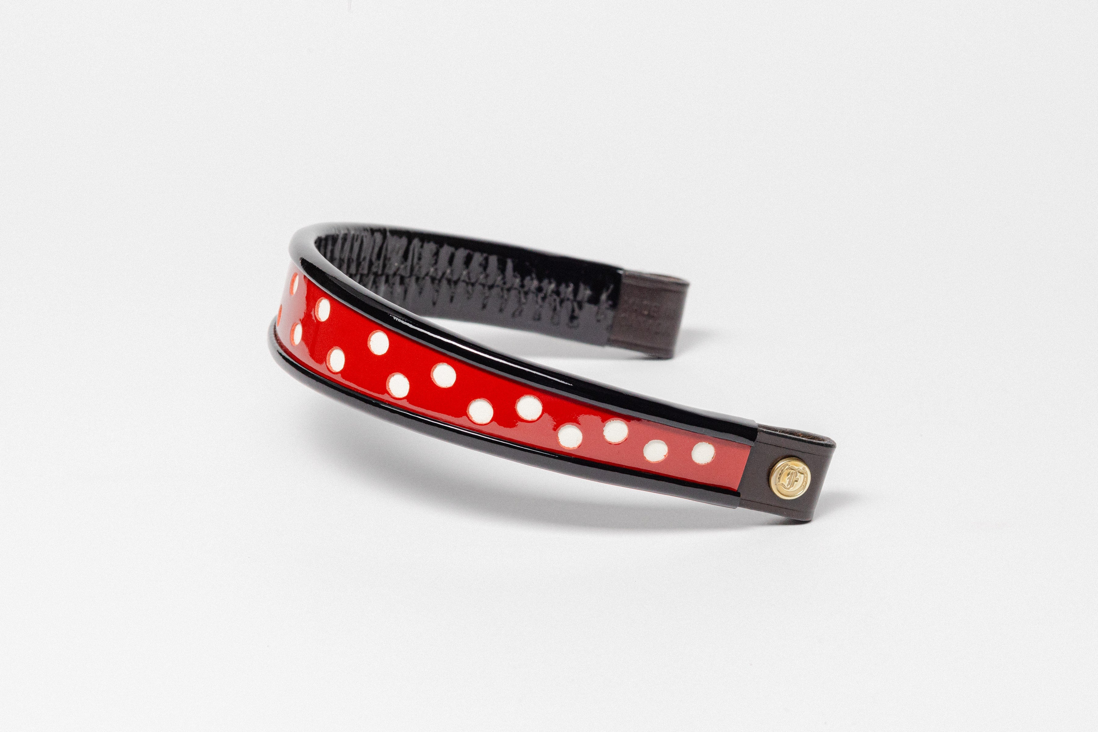 Wide Tapered 13" Turned Edge Browband, red with white polka dots, glossy finished patent leather, dark leather ends with gold button detail, shown on white background.