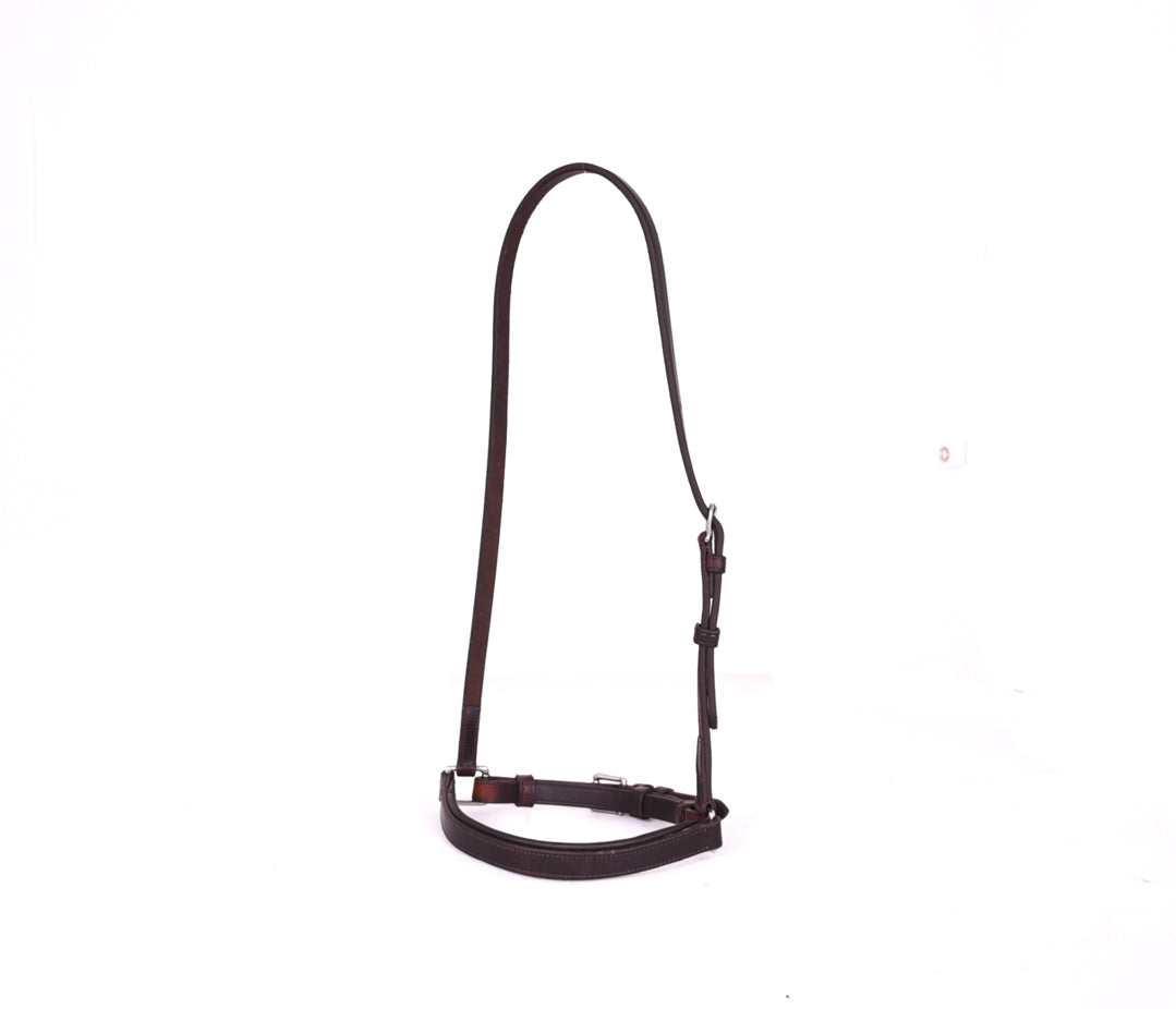 Close-up of an ACTraining Padded Draw Tight Caveson component, showing brown leather construction, buckles, stitching, and padding details, isolated on a white background.