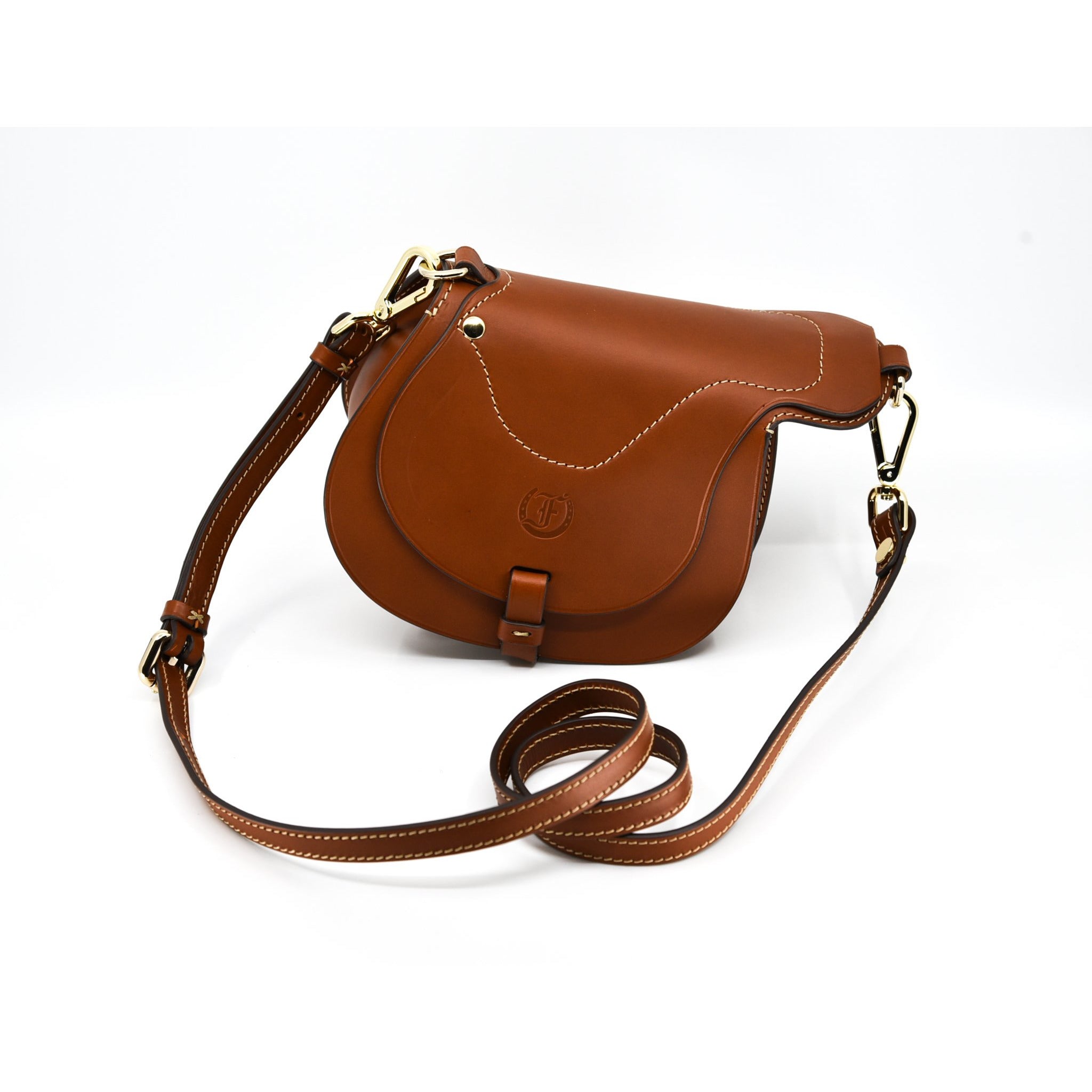 Close-up of Freedman's Tan Leather Derby Shoulder Bag: Saddle-Inspired Flap Closure and Detailed Stitching
