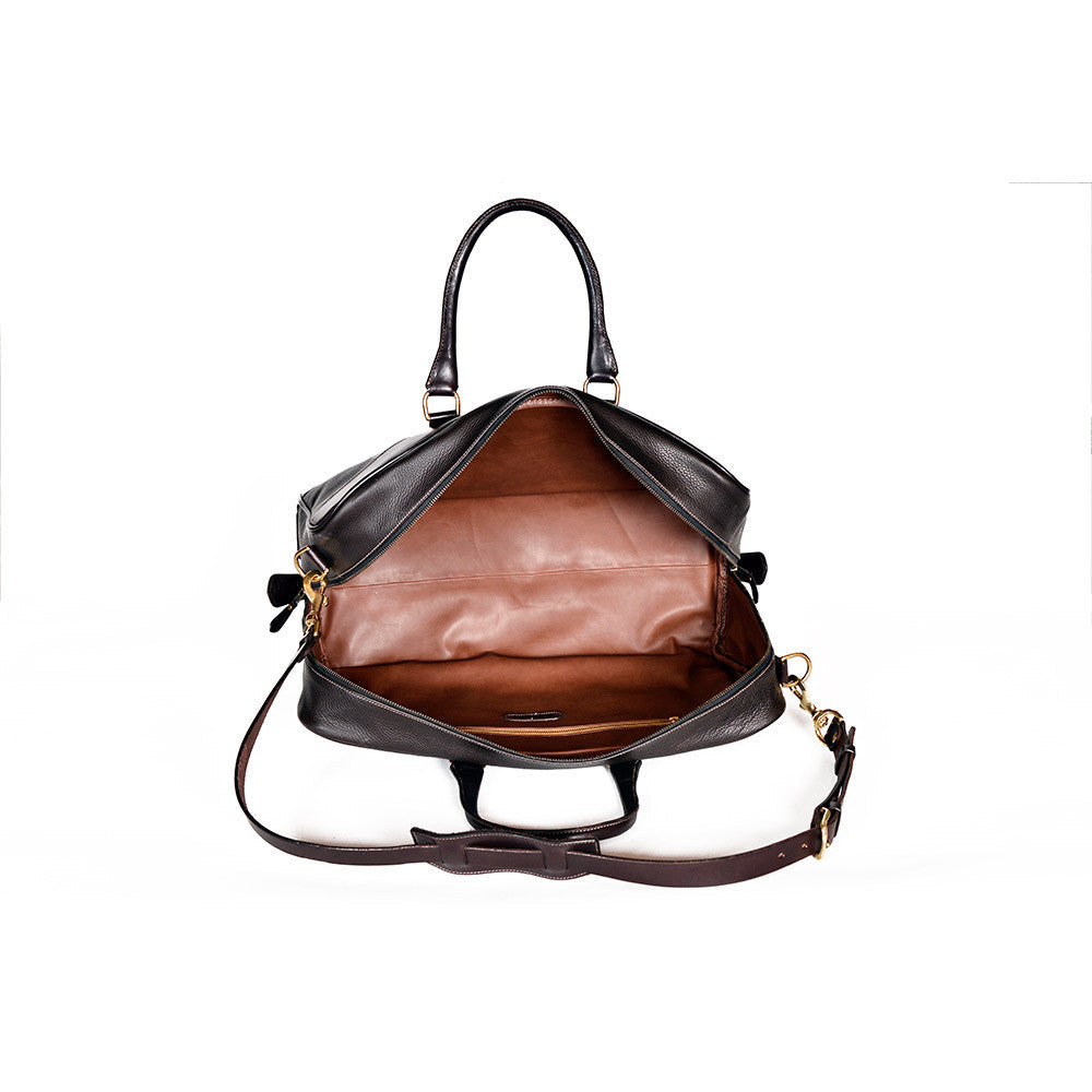 Two-tone leather overnight bag, The Stanhope by Freedman's, open top view, with light fabric interior, shoulder strap, and handles.
