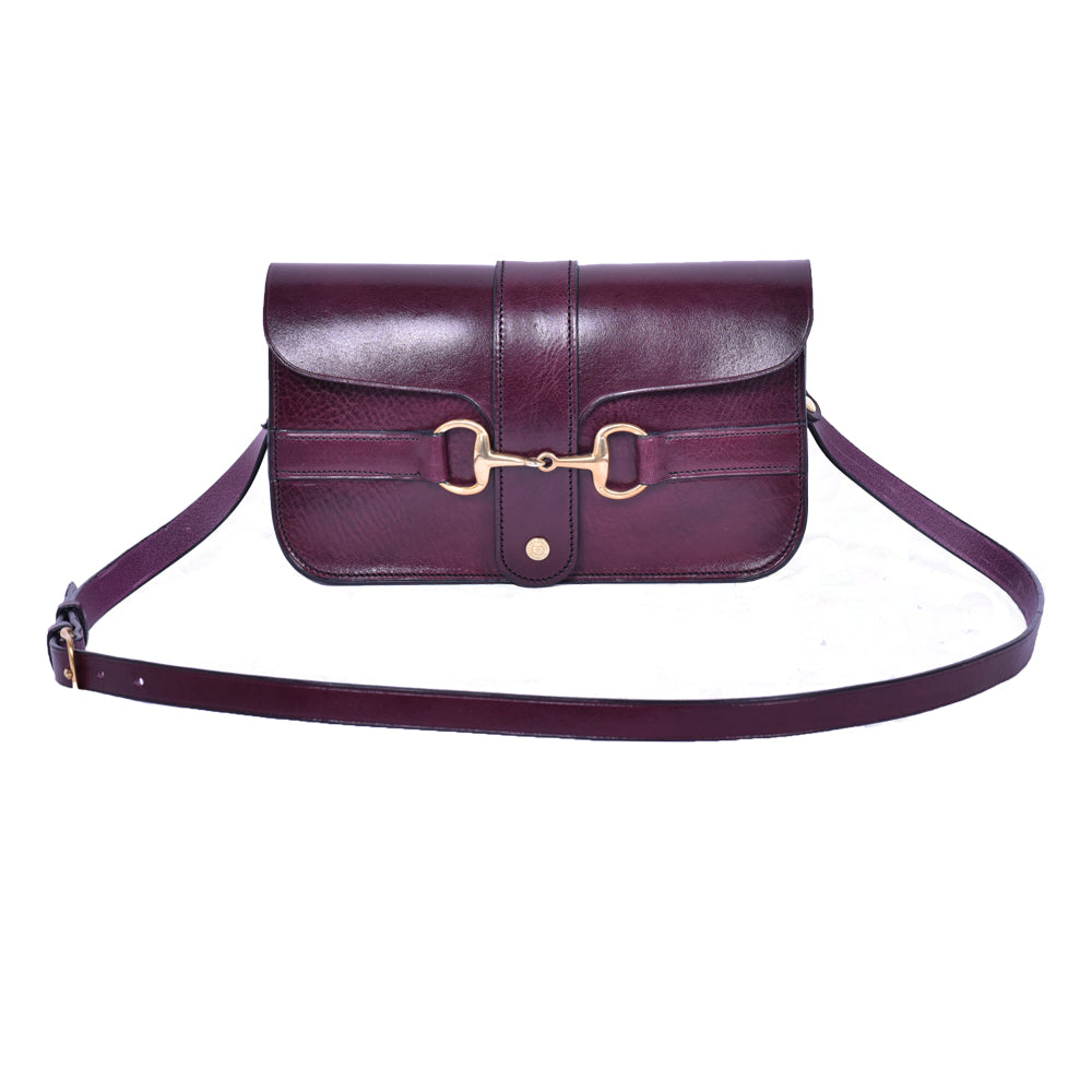 Purple  leather Medium Snaffle Bit Shoulder Bag by Freedman's with Brass snaffle bit hardware and adjustable strap.