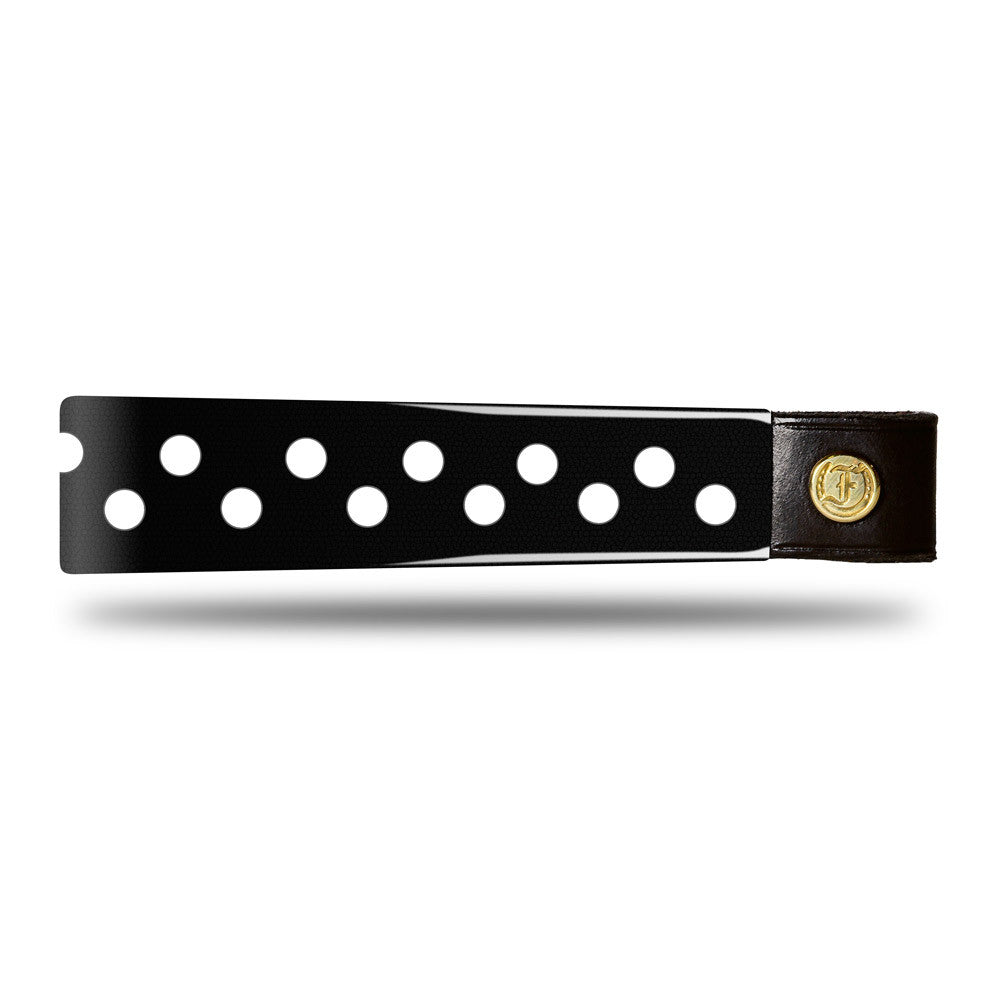 Black Patent Leather Browband with white dots, wide tapered design, polished brass Freedman logo buttons, and dark leather ends, laid flat.