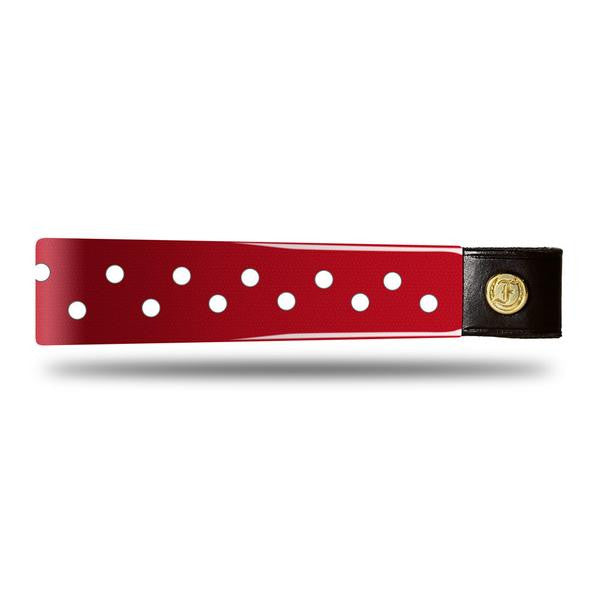 Red Patent Leather Browband with small white dots, wide tapered design, polished brass Freedman logo buttons, and dark leather ends, laid flat