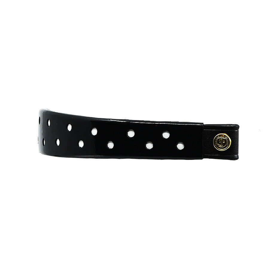 Black Patent Leather Browband with small white dots, wide tapered design, polished brass Freedman logo buttons, and dark leather ends, laid flat.