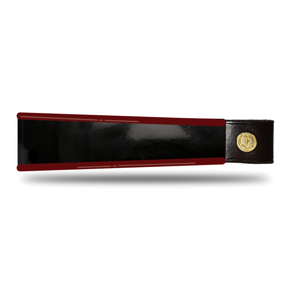 Dark Red and Black patent leather browband, wide tapered design, turned edge, polished brass Freedman logo buttons, laid flat.