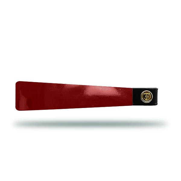 Red patent leather horse browband with gold hardware with Freedman’s logo.