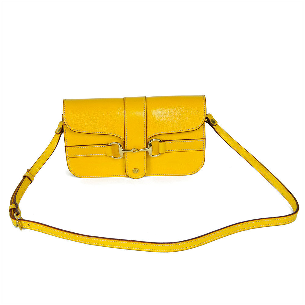 Yellow leather Medium Snaffle Bit Shoulder Bag by Freedman's with silver snaffle bit hardware and adjustable strap.