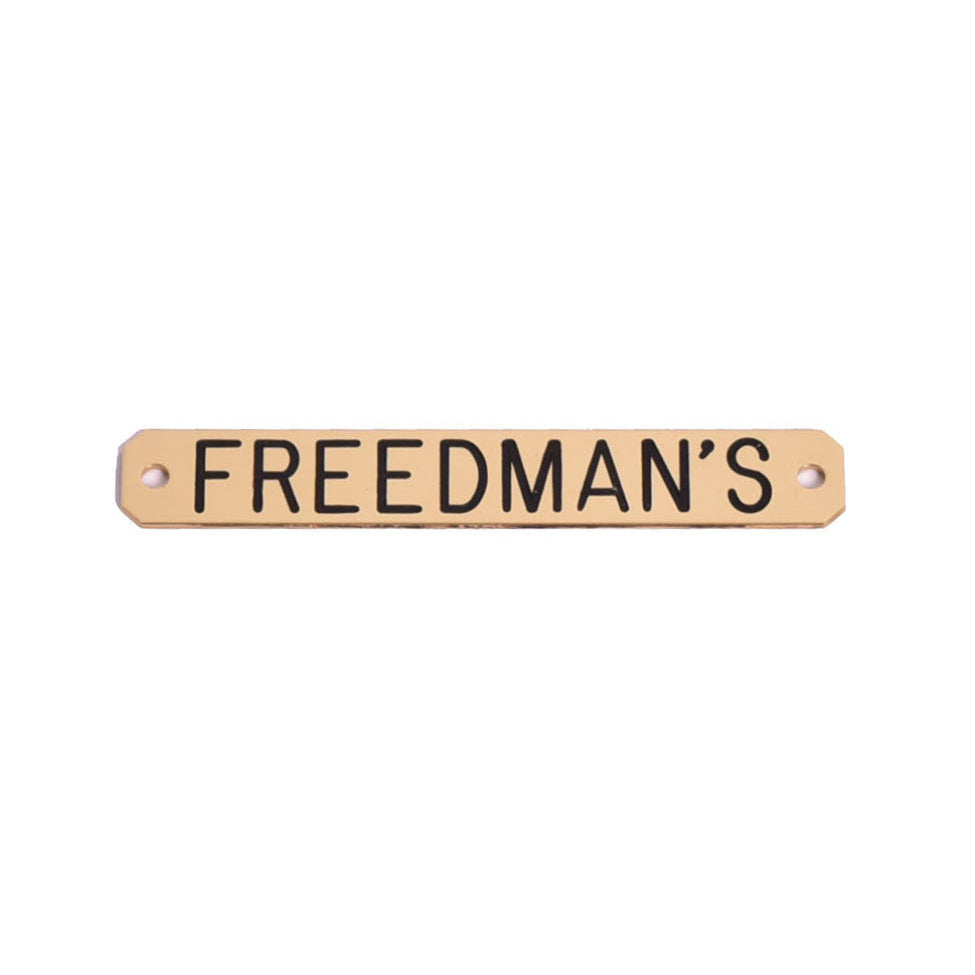 Brass engraved metal halter plate with the text 'FREEDMAN'S' on it, typically used for marking ownership on horse halters.