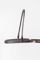 ACTraining Breast Collar and Neck Strap, designed for training or riding, made of brown leather with adjustable buckles and hardware, laid flat on a white background.