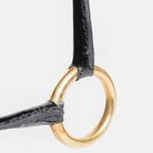 Close-up of the gold ring detail on an Arabian Show Cable Halter.