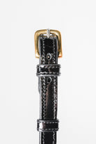  Zoomed-in view of the buckle and strap detail on an Arabian Show Cable Halter. - Side view.