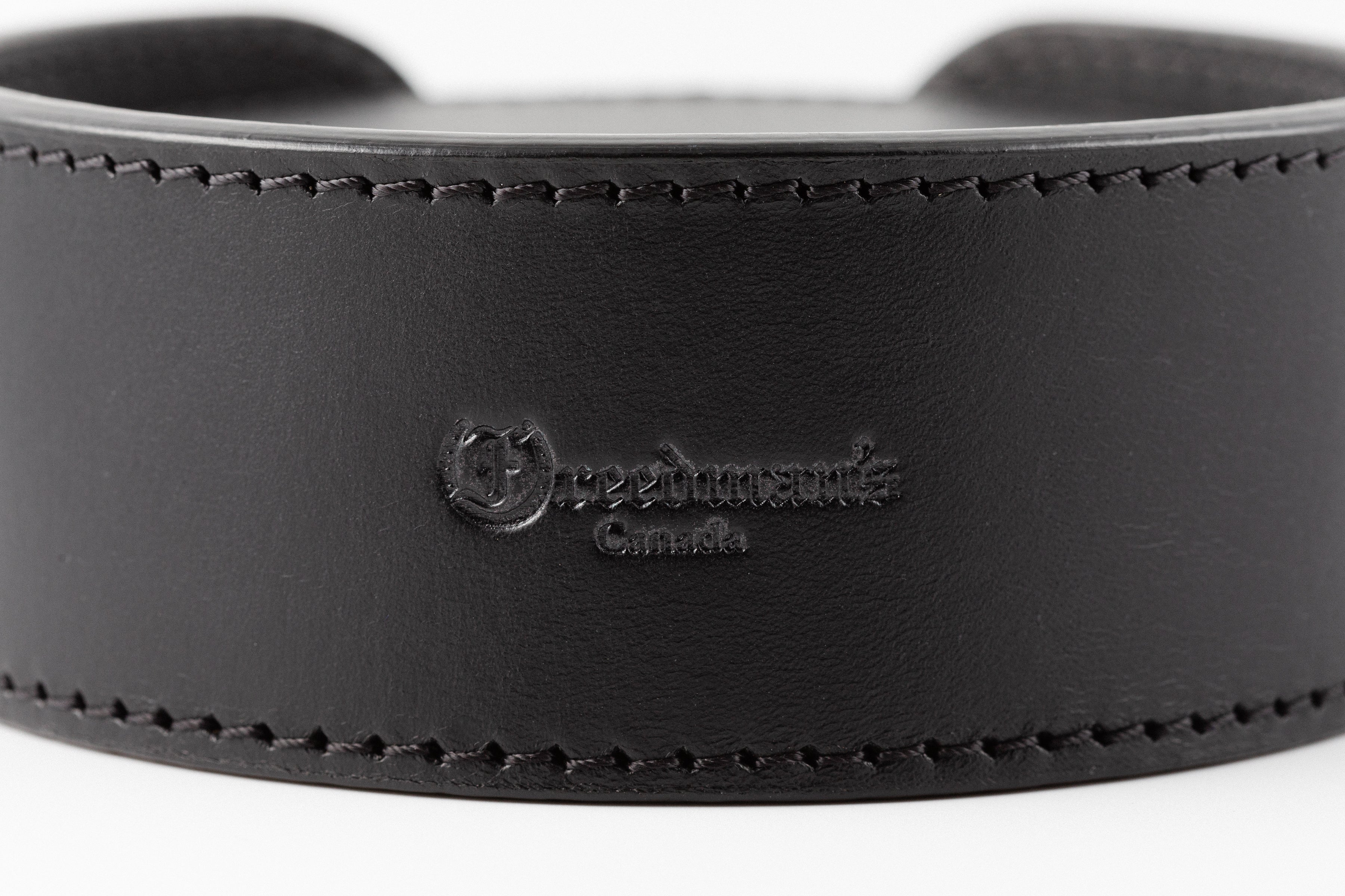 Set of Black Leather Coasters in Holder by Freedman's, Each Coaster Features Distinctive Logo and "Canada" Marking