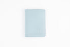 Freedman's Credit Card Holder: Slim and Durable Wallet, Close-Up on Leather Texture and Stitching - Ice Blue