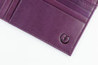 Freedman's Zip Top Wallet: Close-up of Interior Card Slots and Embossed Logo Detail