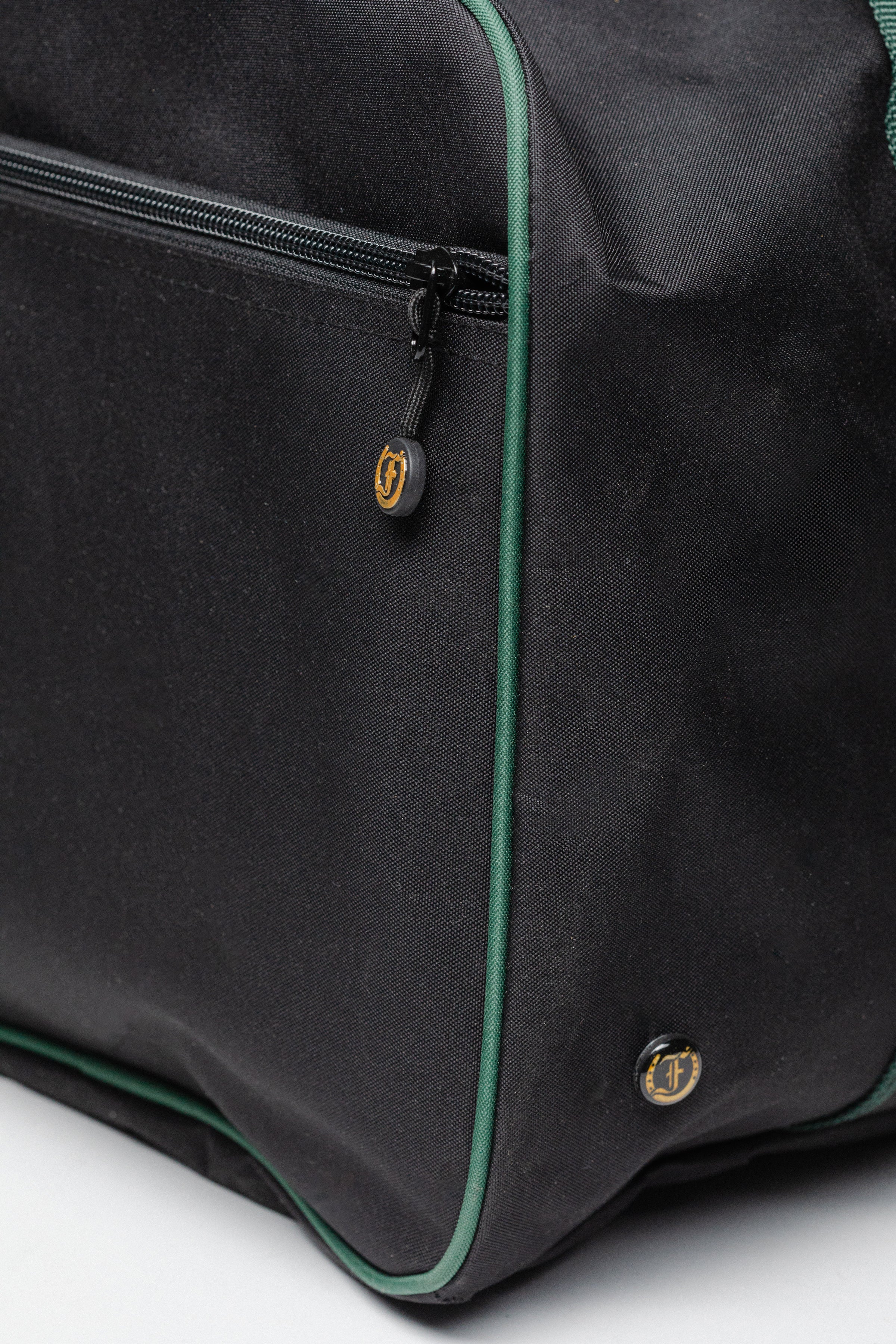 Team Freedman's Duffel Bag, close-up showing zipper and logo detail.