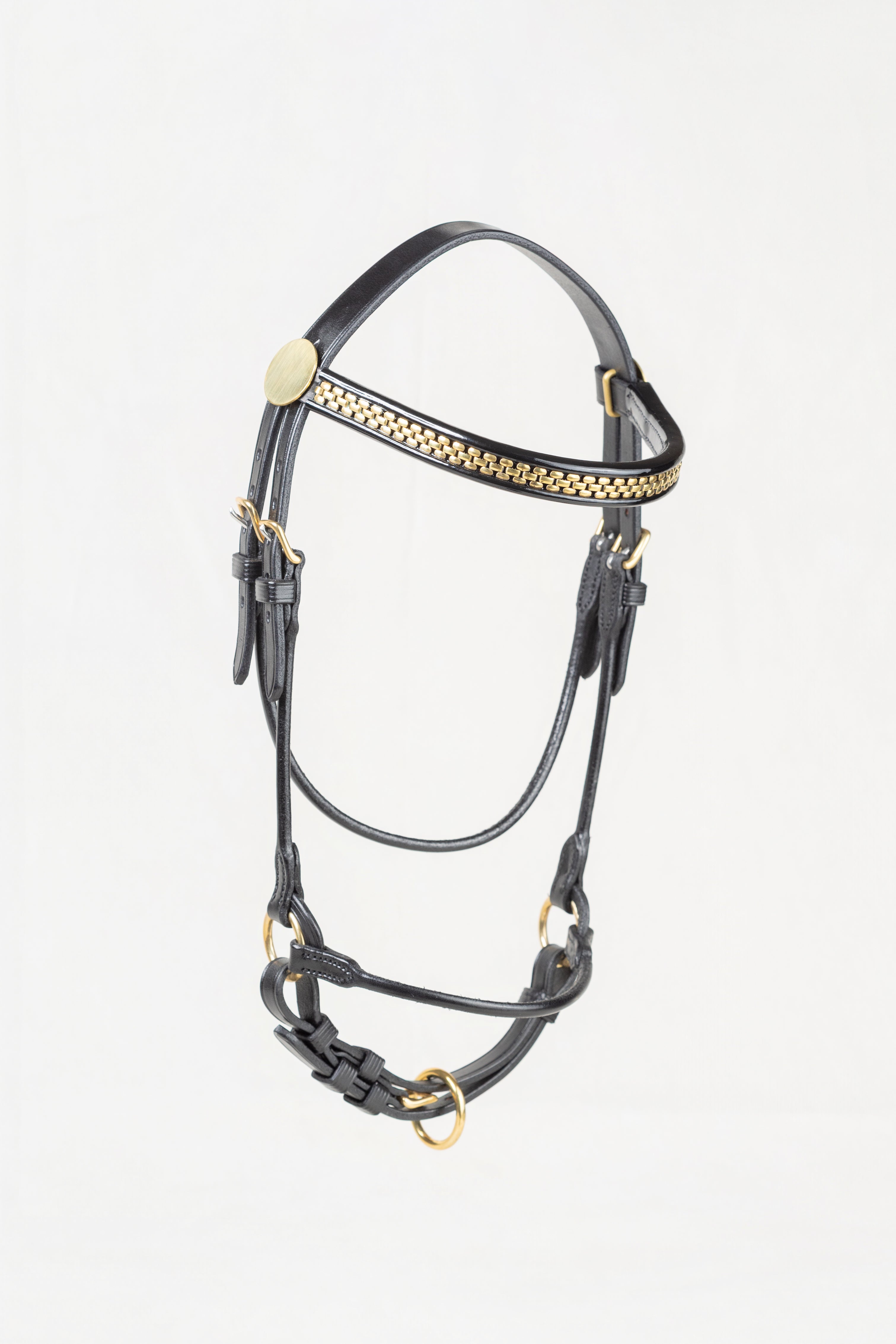 Black leather horse halter with gold braided trim and gold-tone hardware, shown on a plain white background.